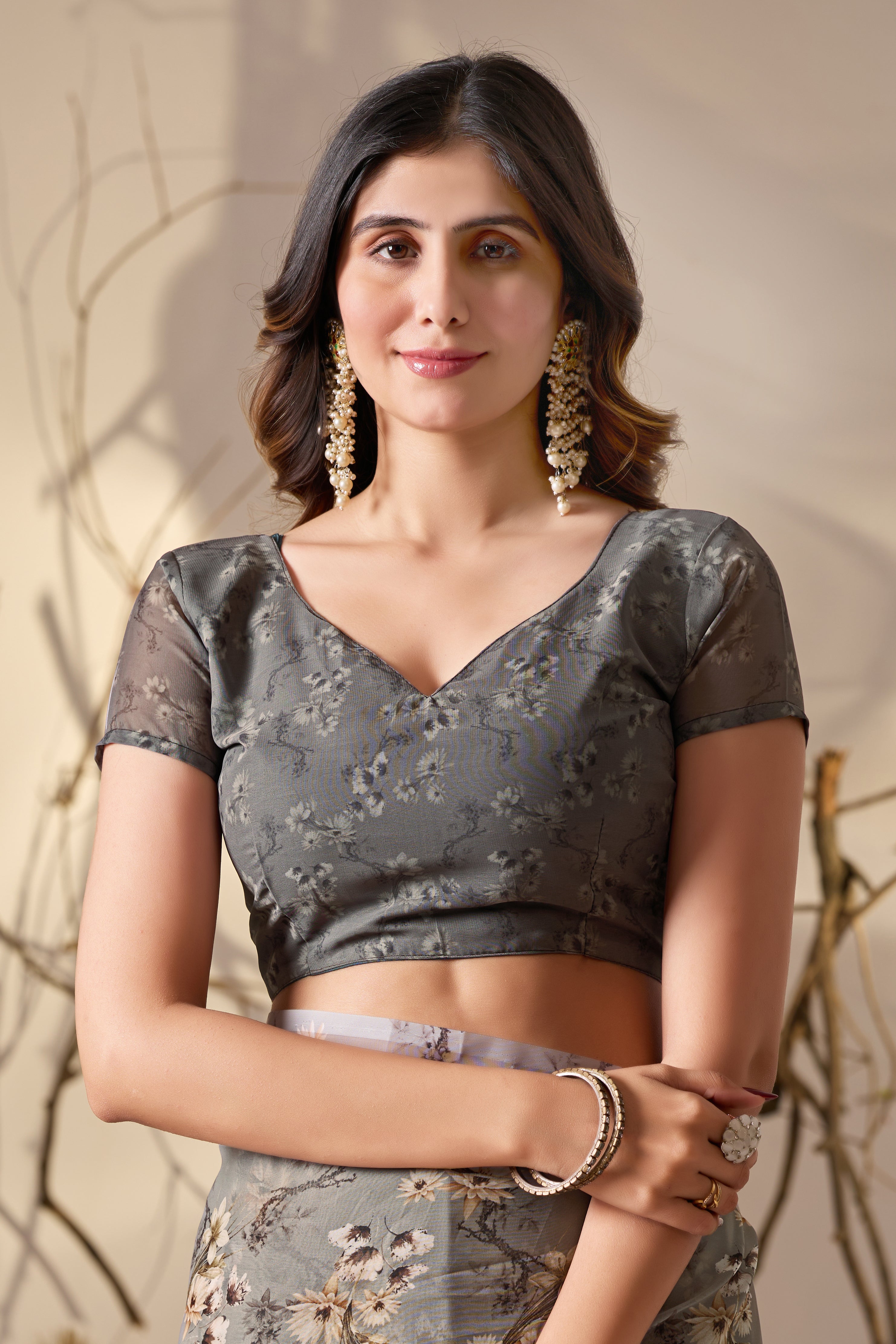 Soft Georgette Saree in Muted Grey Base Adorned with All-Over Floral Digital Print and Enhanced with Ornate Tribal-Style Patterned Pallu Featuring Pink