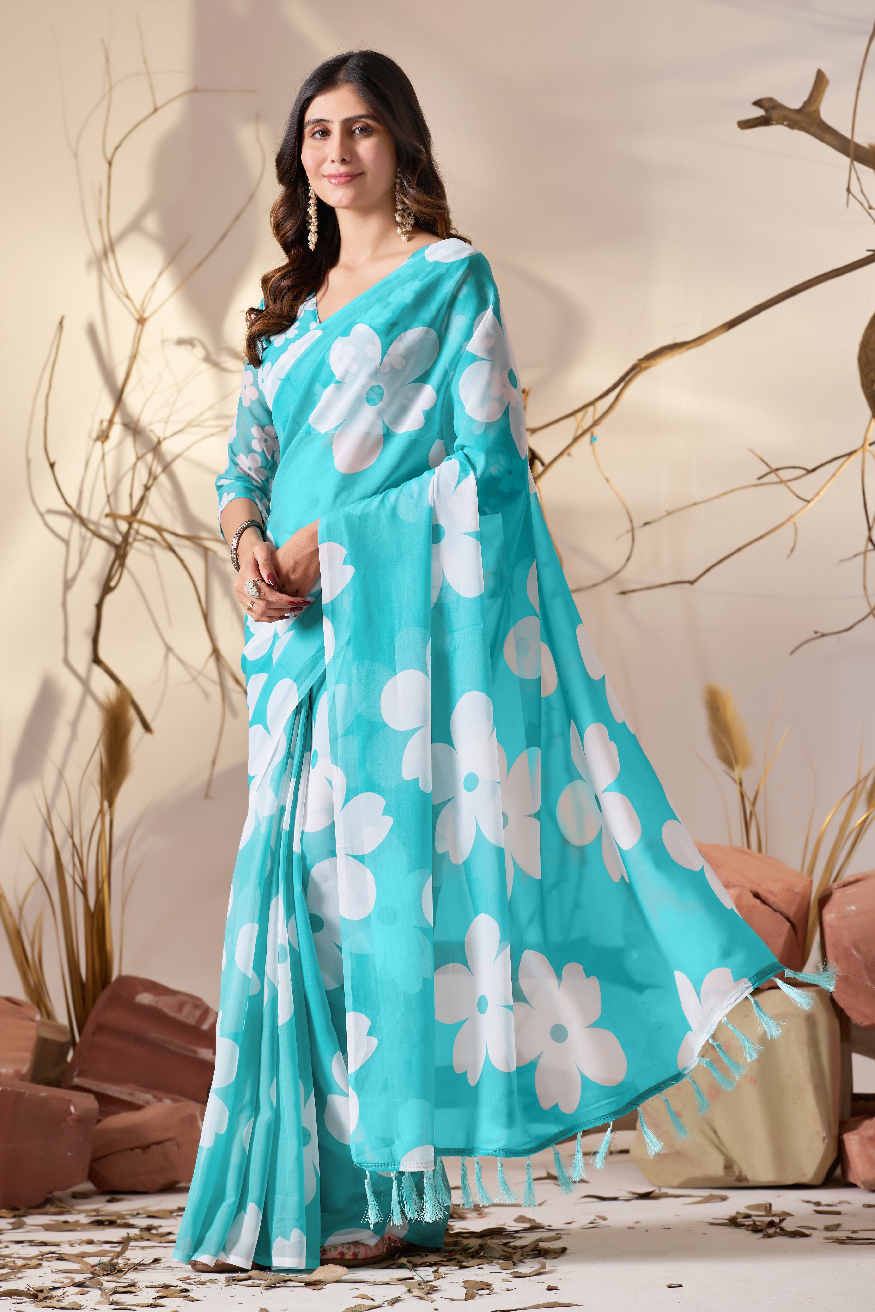 Soft Georgette Saree in Aqua Blue Shade Beautified with Bold White Oversized Floral Digital Print