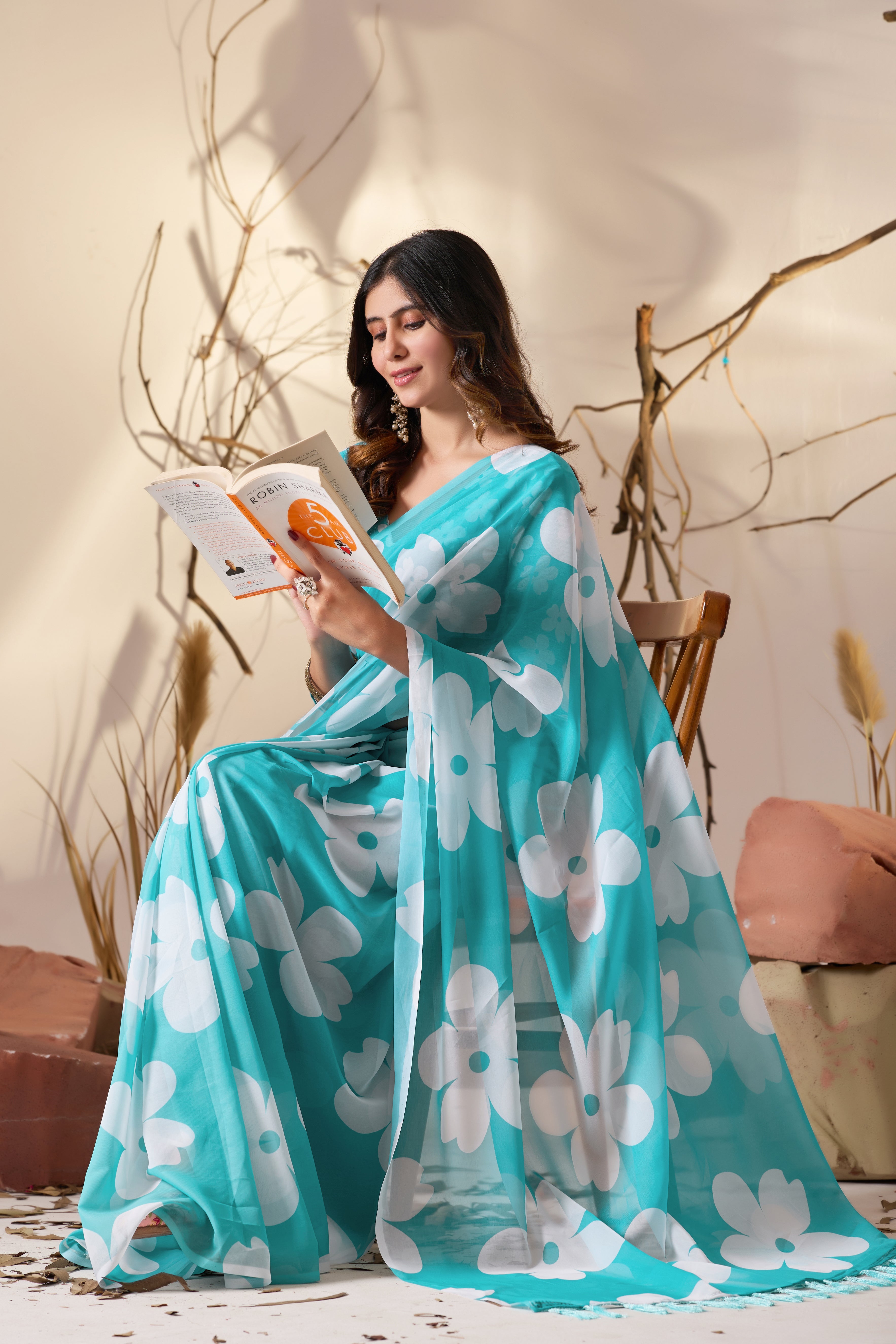 Soft Georgette Saree in Aqua Blue Shade Beautified with Bold White Oversized Floral Digital Print