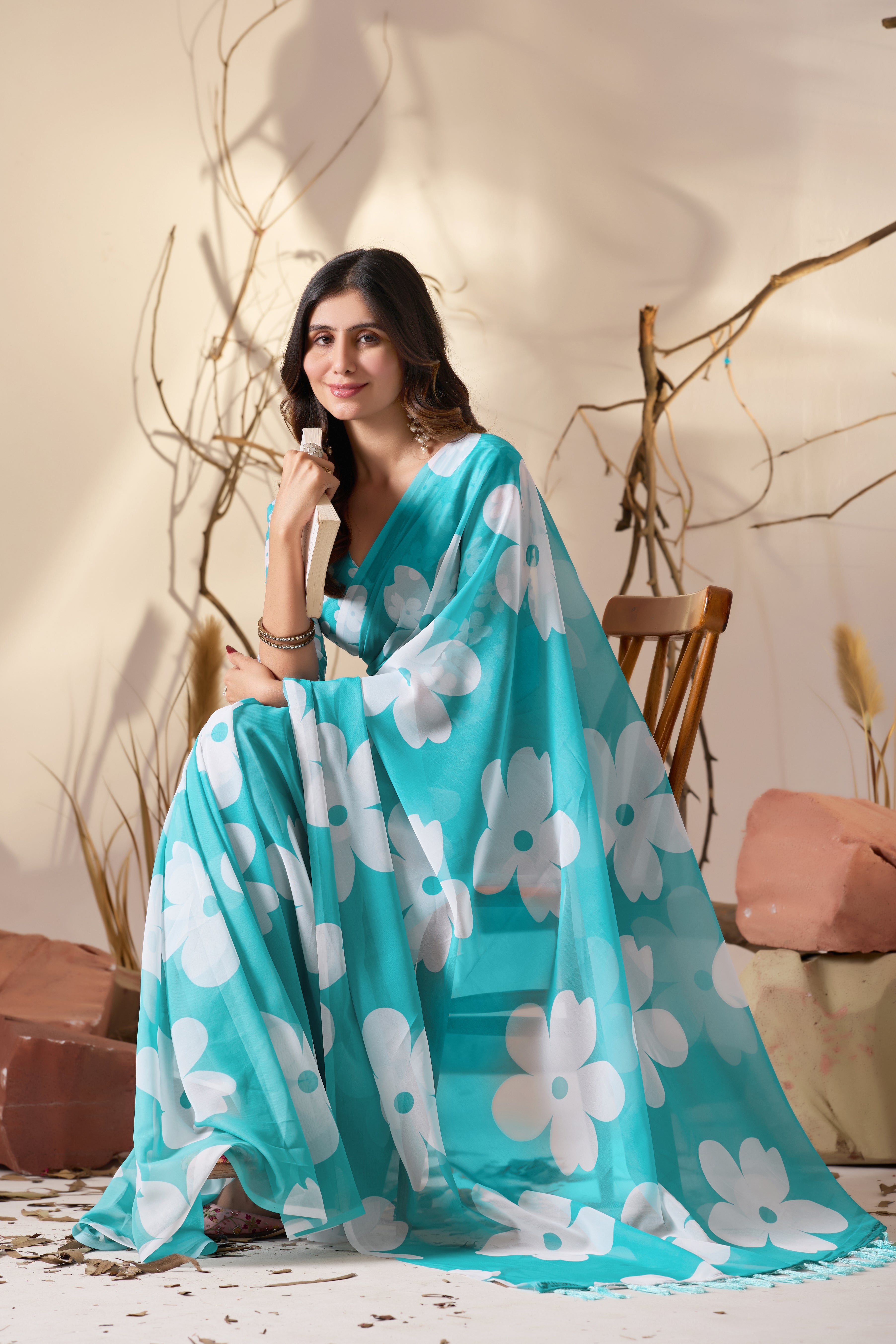 Soft Georgette Saree in Aqua Blue Shade Beautified with Bold White Oversized Floral Digital Print