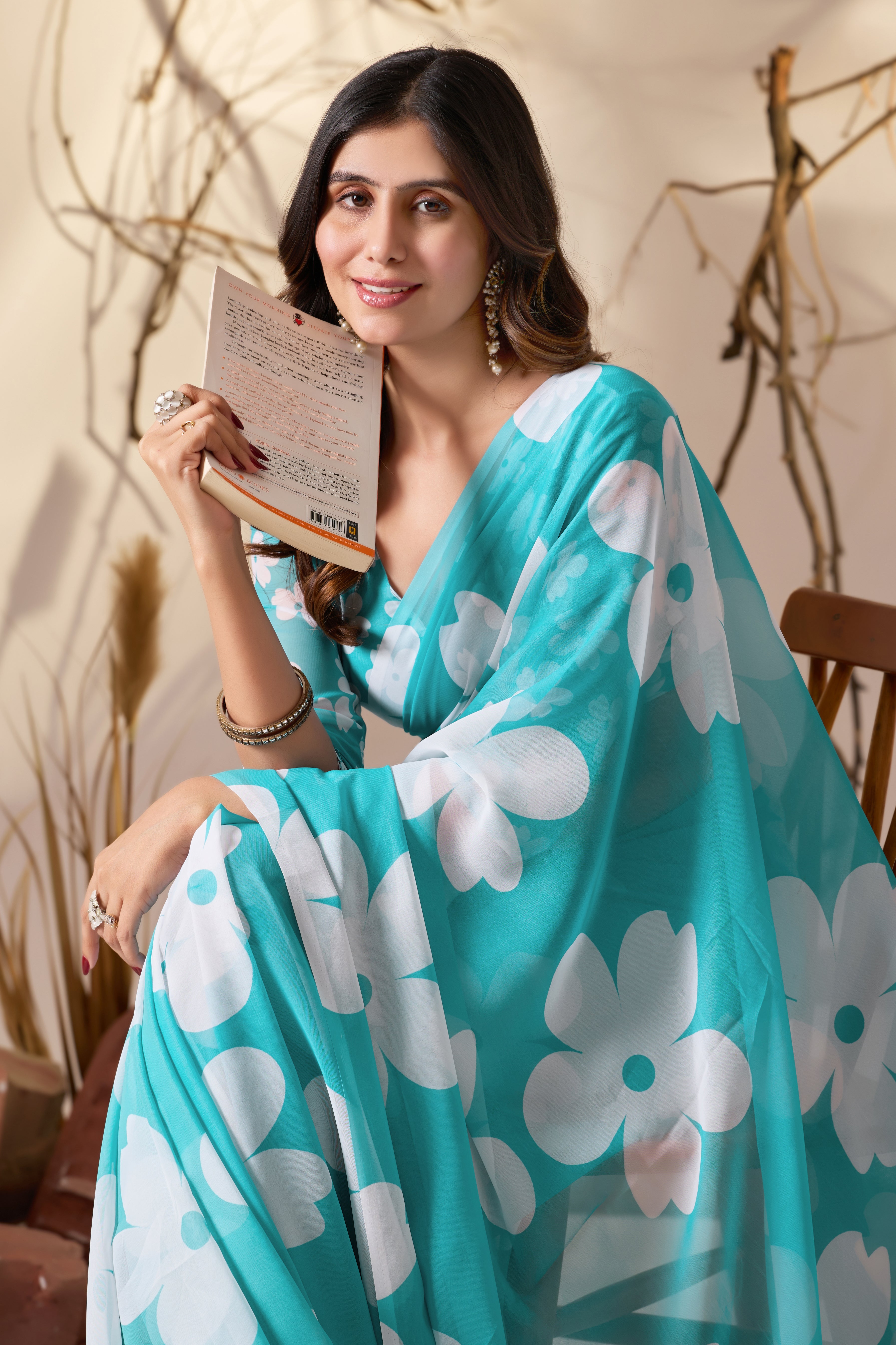 Soft Georgette Saree in Aqua Blue Shade Beautified with Bold White Oversized Floral Digital Print