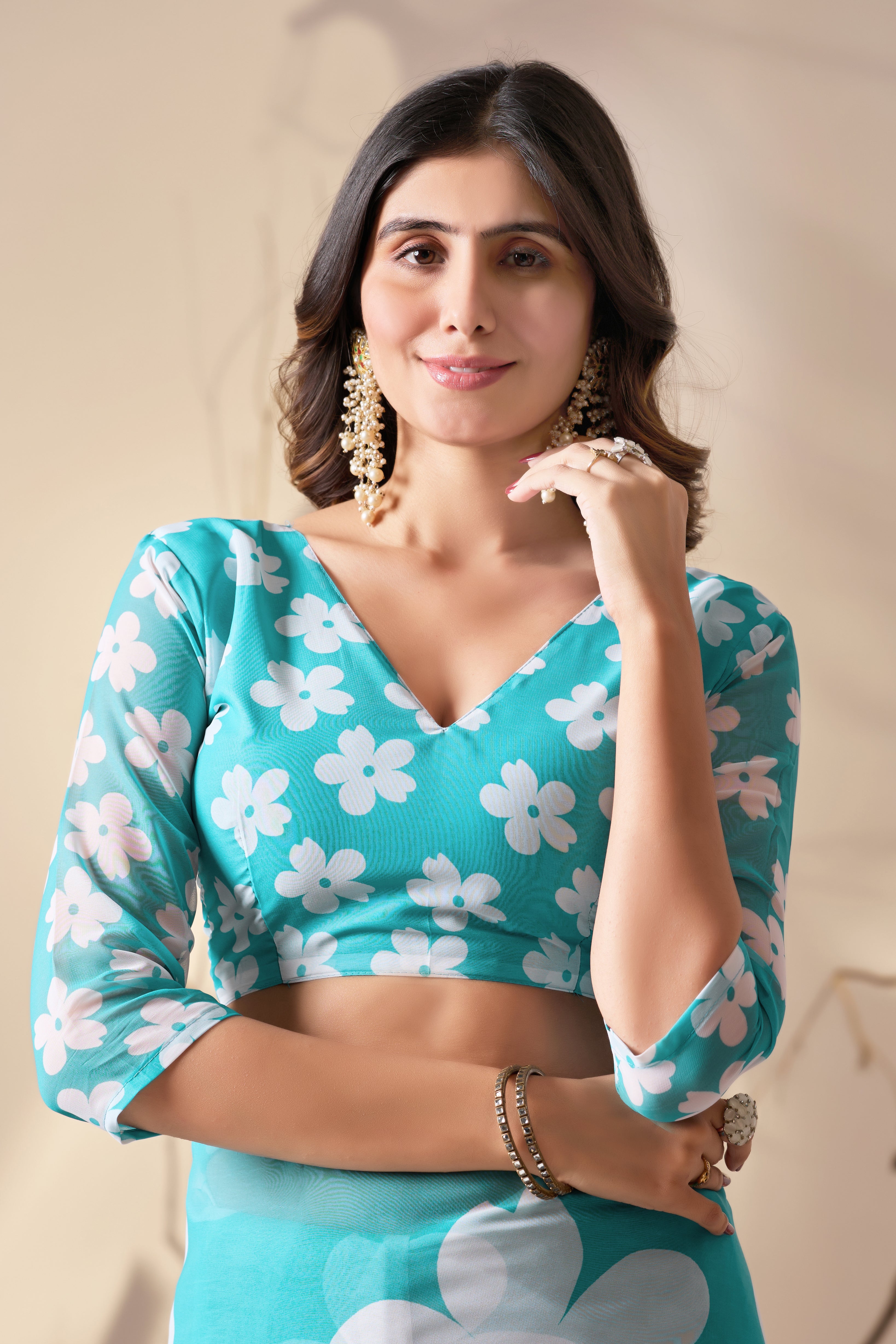 Soft Georgette Saree in Aqua Blue Shade Beautified with Bold White Oversized Floral Digital Print