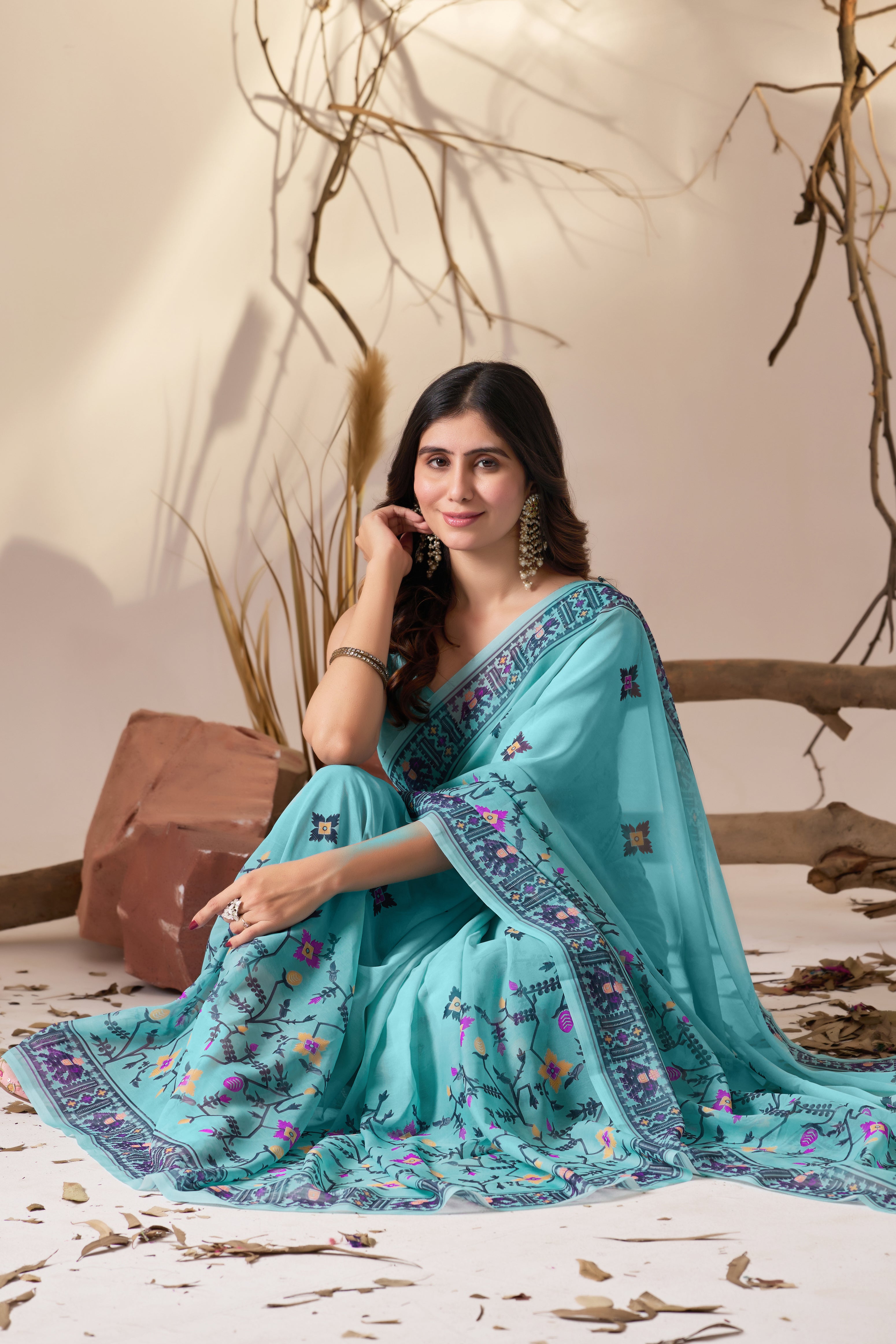 Soft Georgette Saree in Refreshing Sea Green Tone Highlighted with Intricate Digital Tribal