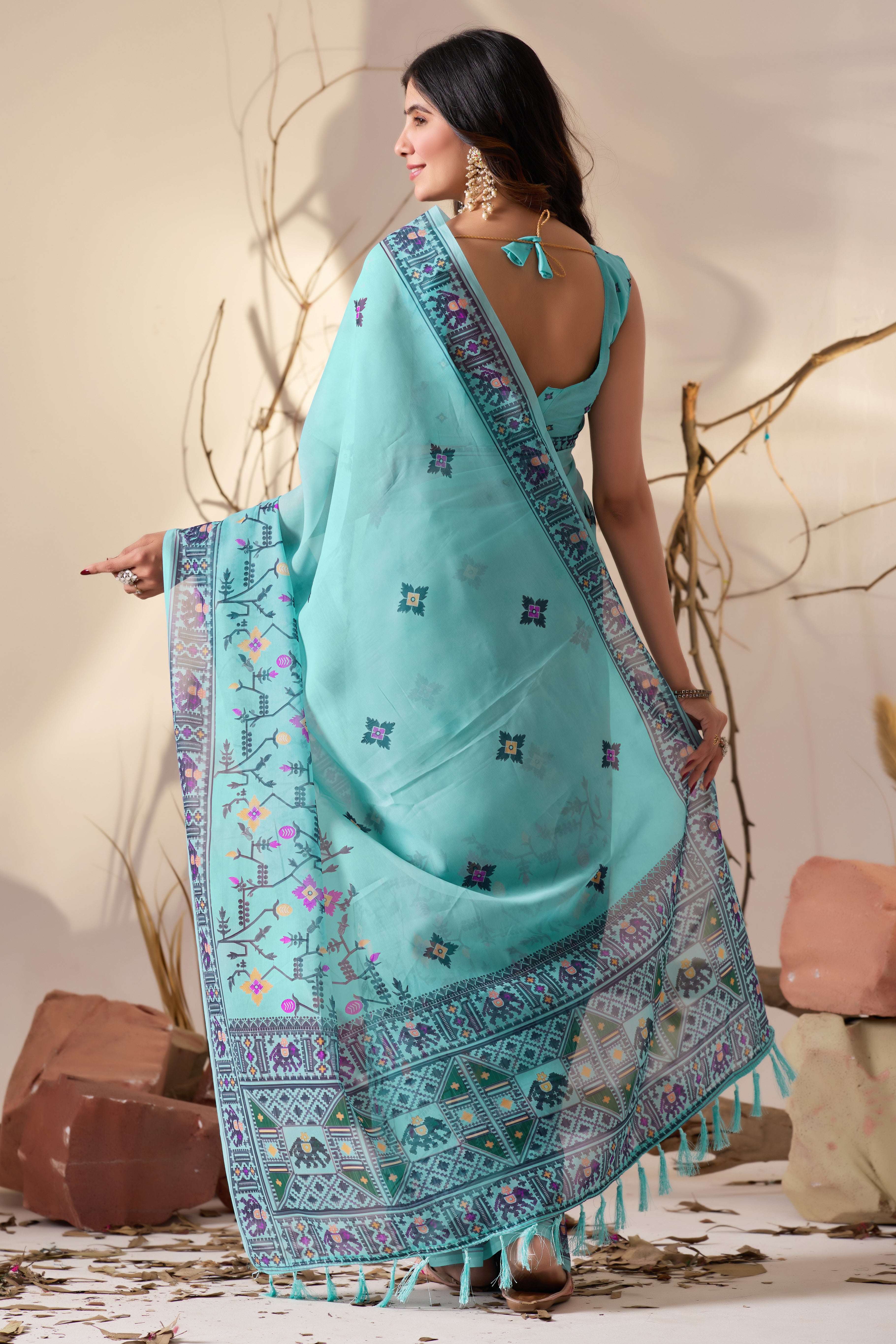 Soft Georgette Saree in Refreshing Sea Green Tone Highlighted with Intricate Digital Tribal