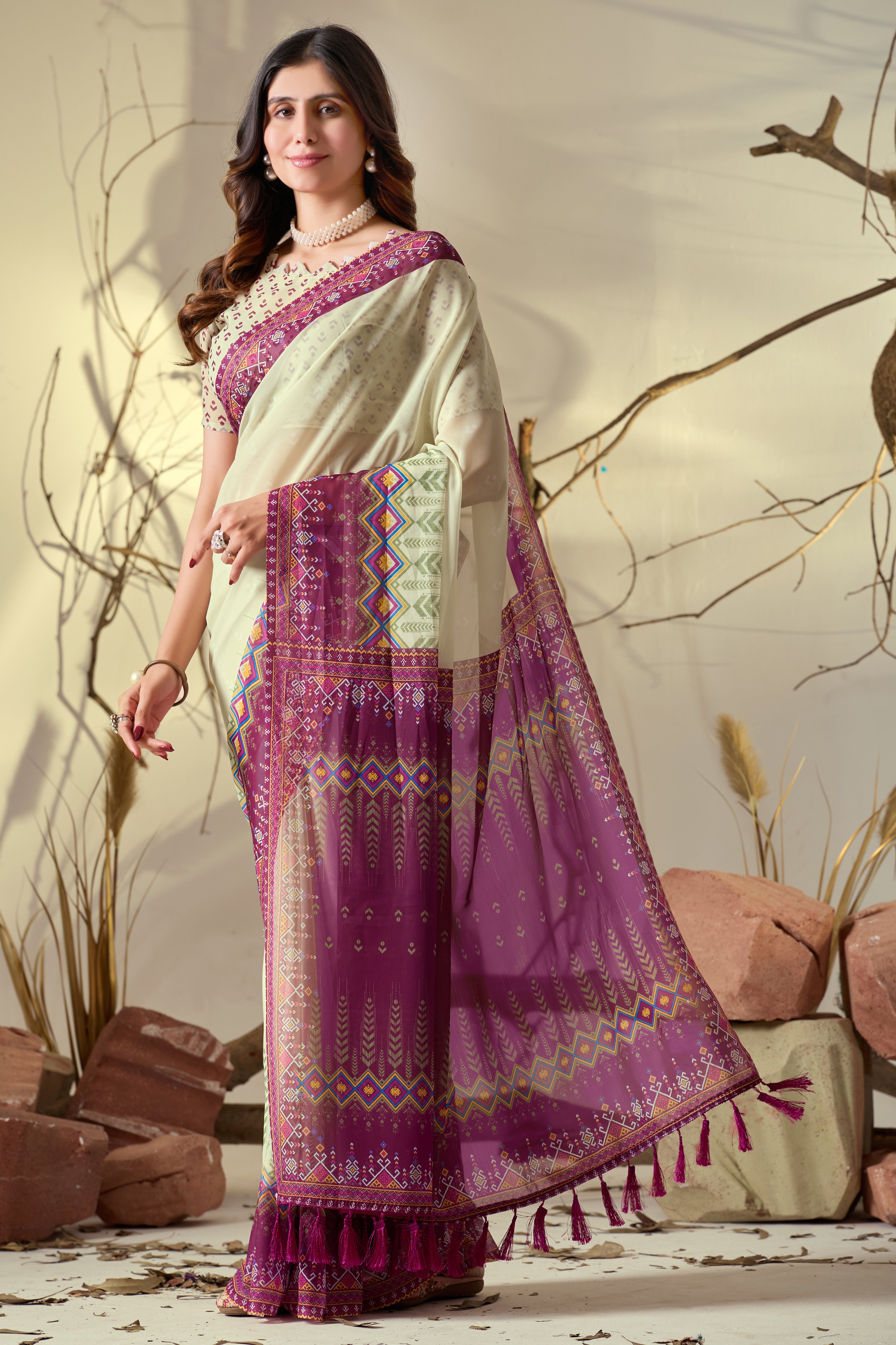 Soft Georgette Saree with Artistic Cream body and Deep Pink Geometric Digital Print border and pallu with Tassel Detailing