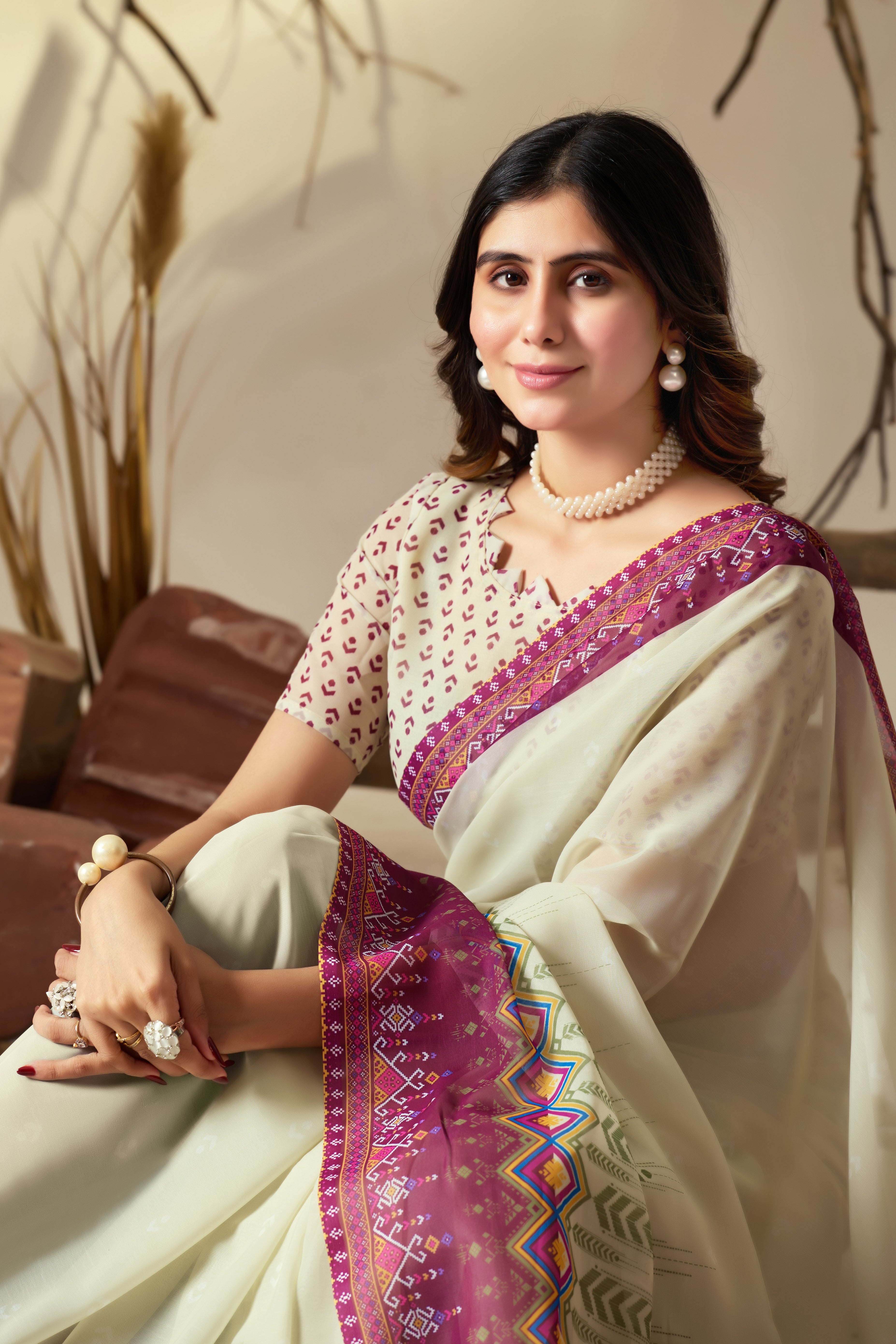 Soft Georgette Saree with Artistic Cream body and Deep Pink Geometric Digital Print border and pallu with Tassel Detailing