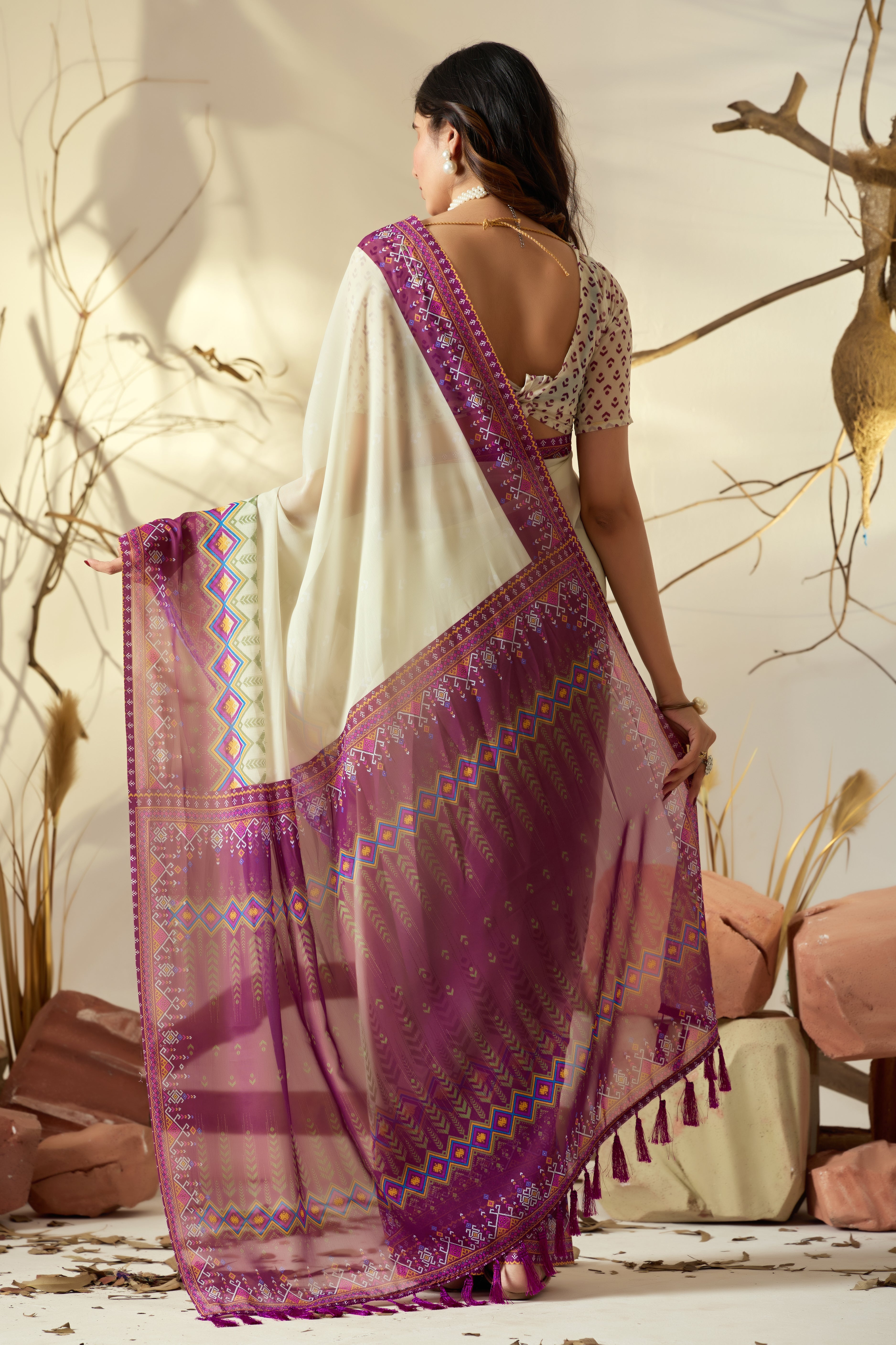 Soft Georgette Saree with Artistic Cream body and Deep Pink Geometric Digital Print border and pallu with Tassel Detailing