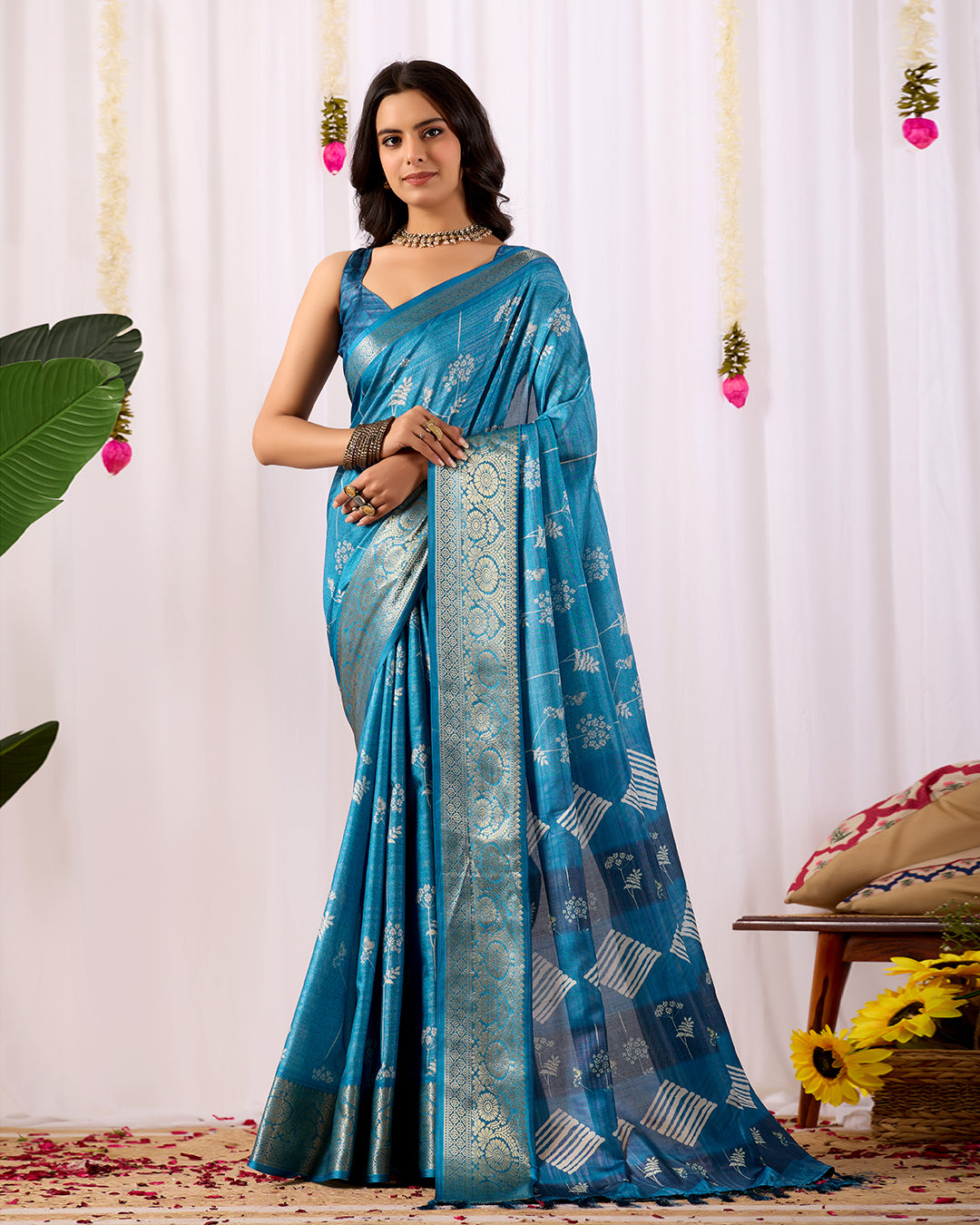 Premium Soft Lichi Silk Saree highlighted with graceful silver zari weaving and intricate ethnic motifs