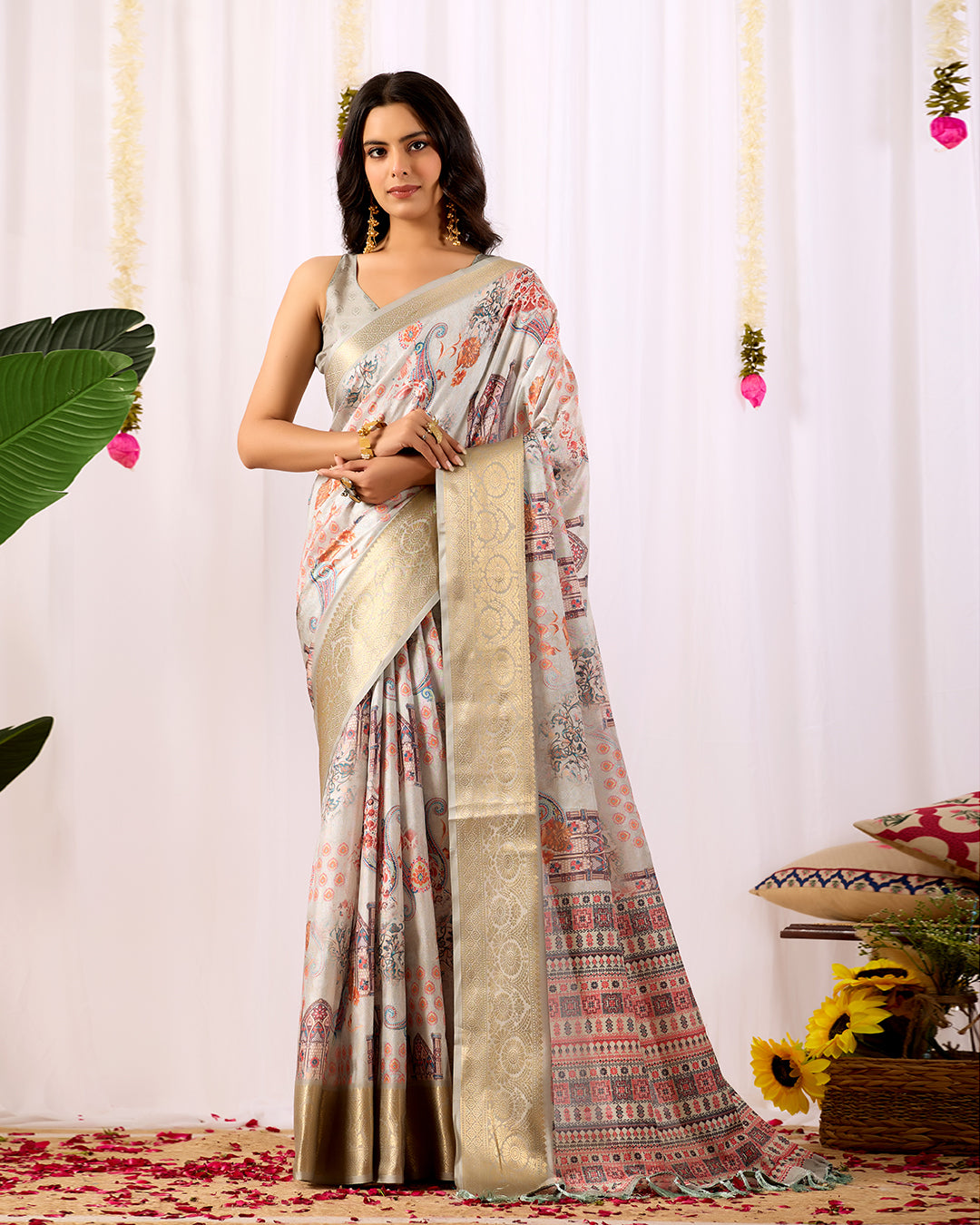 Elegant Soft Lichi Silk Saree featuring royal ethnic motifs with a lavish golden zari woven border