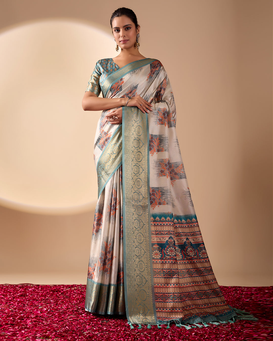 Elegant Soft Lichi Silk Saree in a refined ivory and teal tone, featuring traditional motifs and intricate digital prints enhanced with a golden zari border
