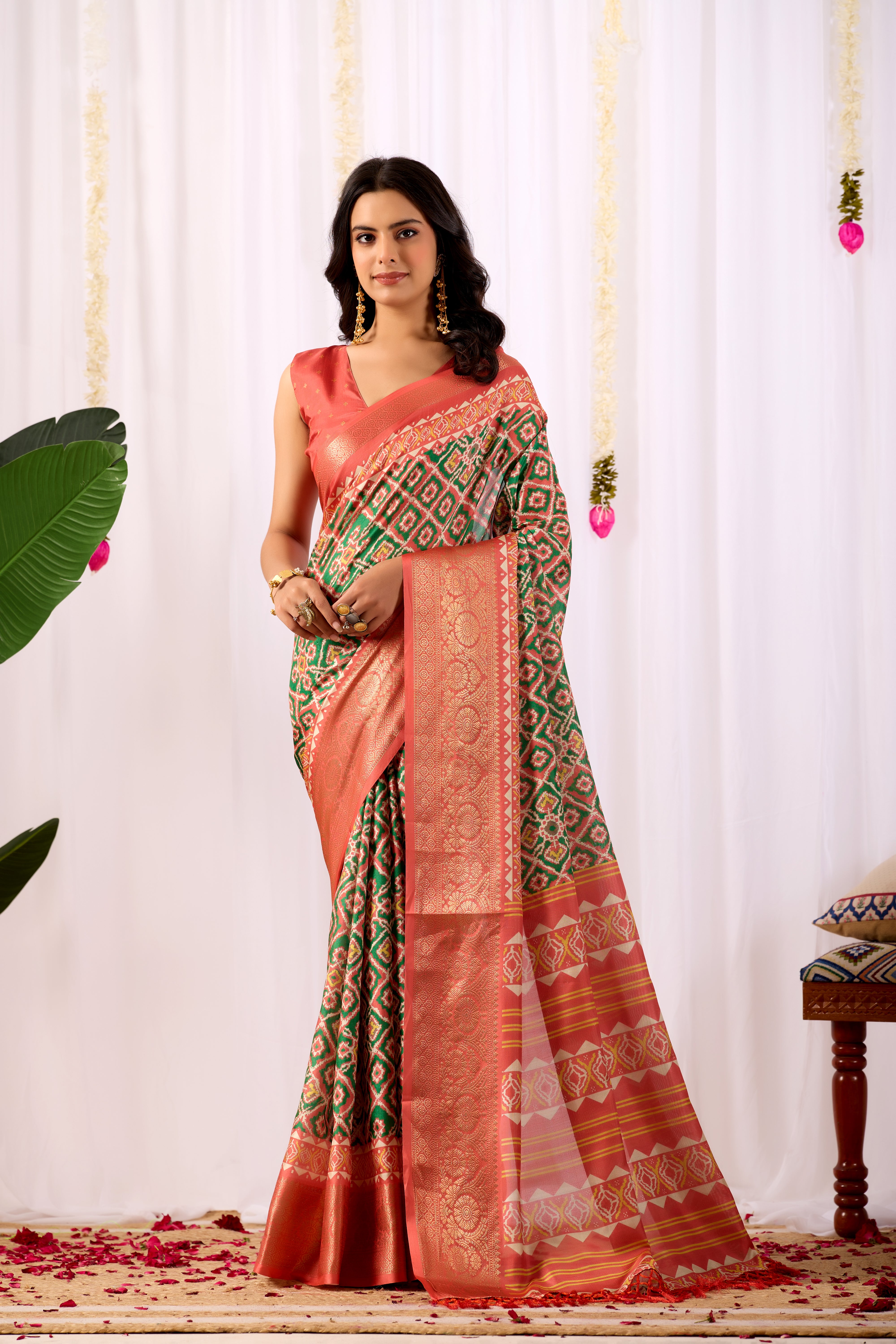 Soft Lichi Silk Saree with Exquisite Patola-Inspired Geometric Print and a Lavish Zari Woven Border
