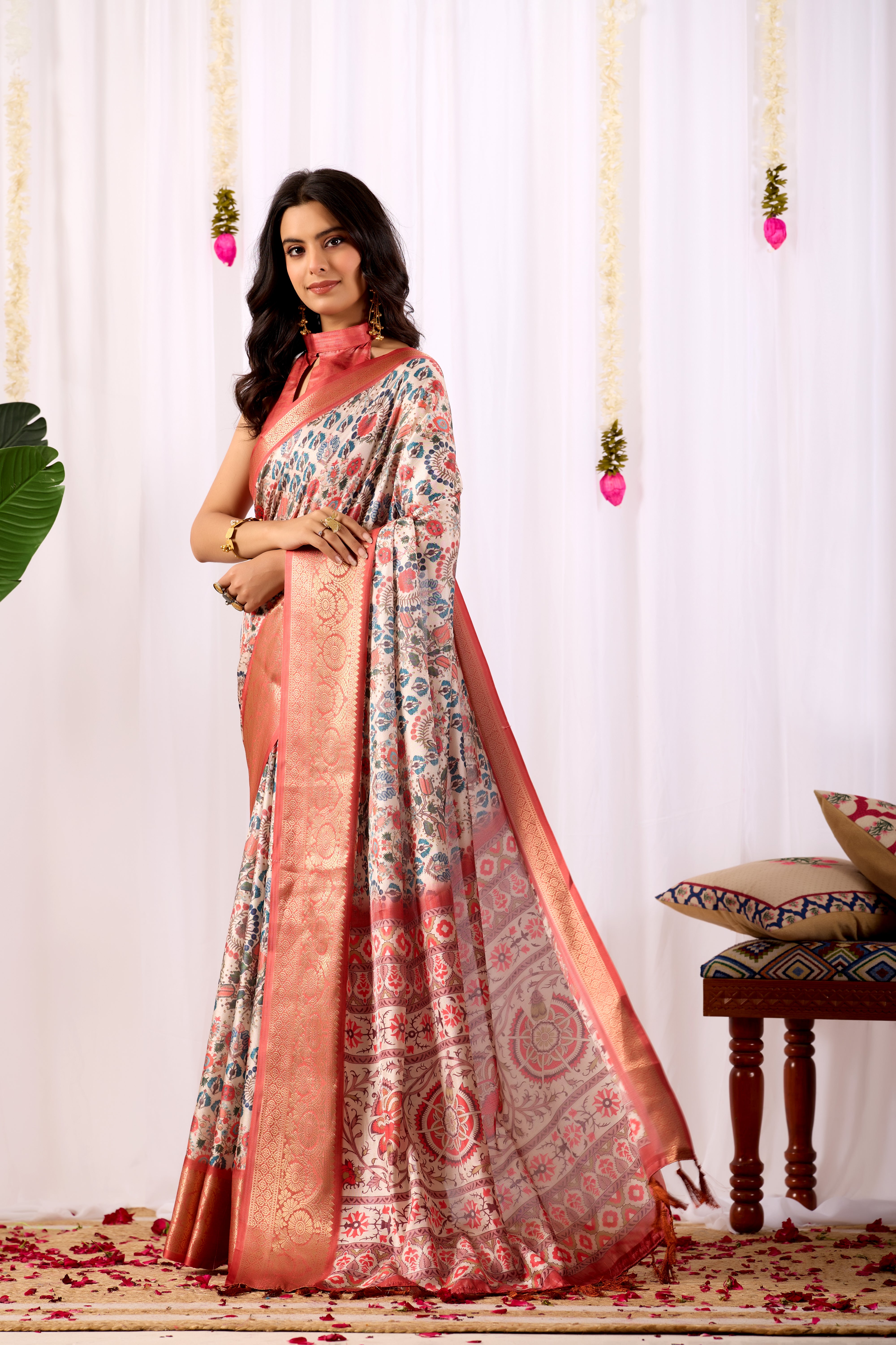 Premium Soft Lichi Silk Saree with elegant Patola-inspired geometric prints beautifully crafted with a luxurious zari woven border