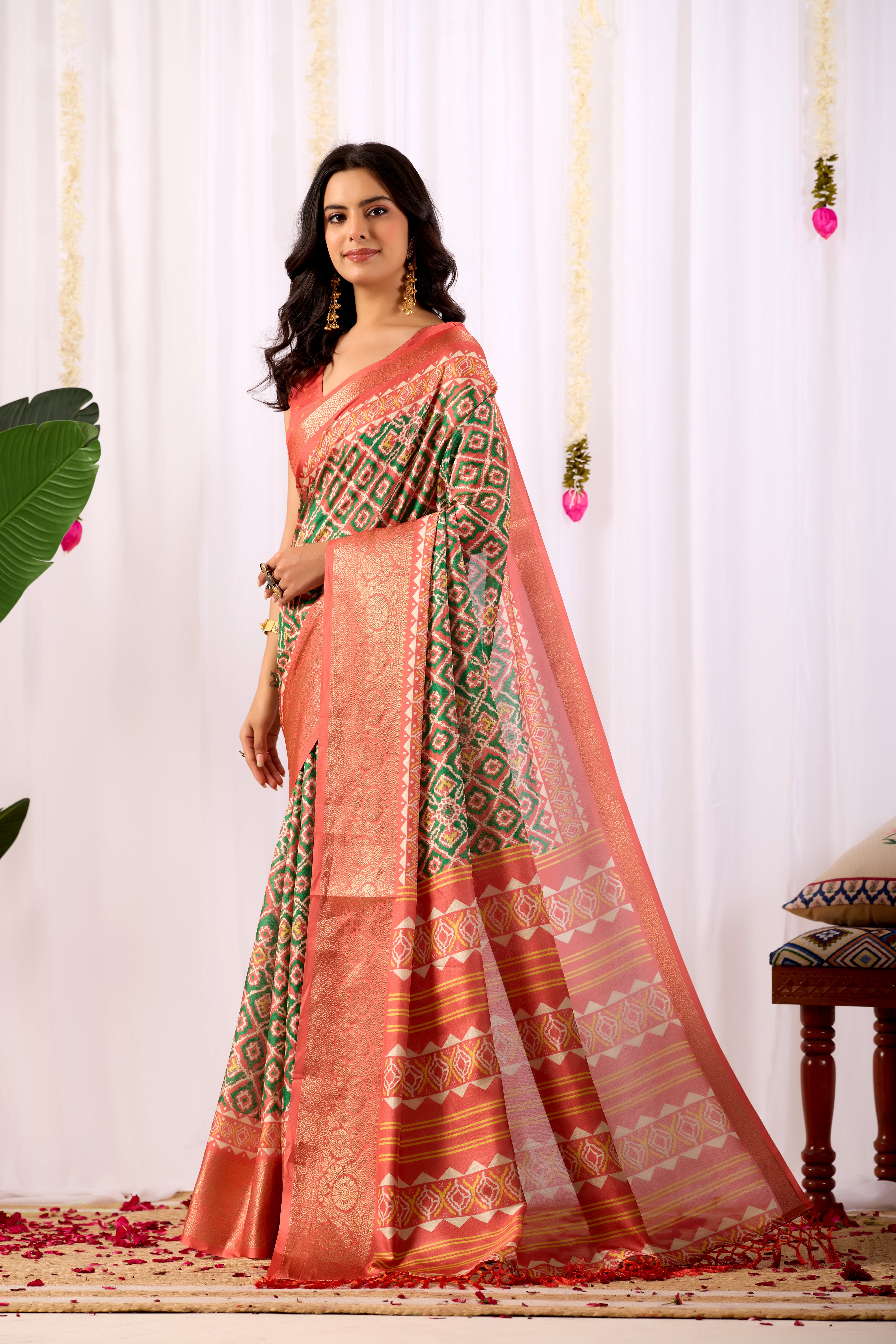 Soft Lichi Silk Saree with Exquisite Patola-Inspired Geometric Print and a Lavish Zari Woven Border