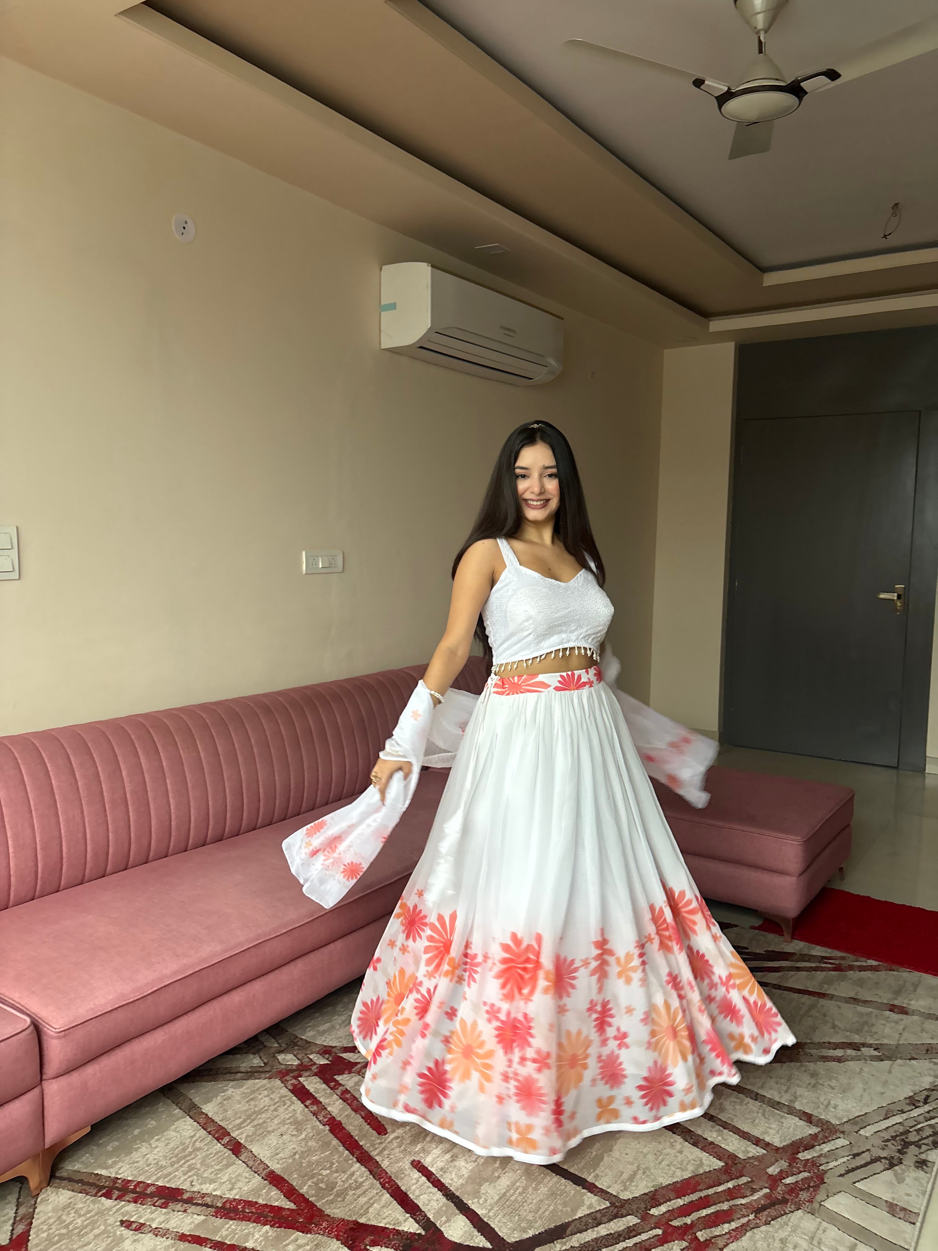 A swirl of white elegance kissed with coral floral magic