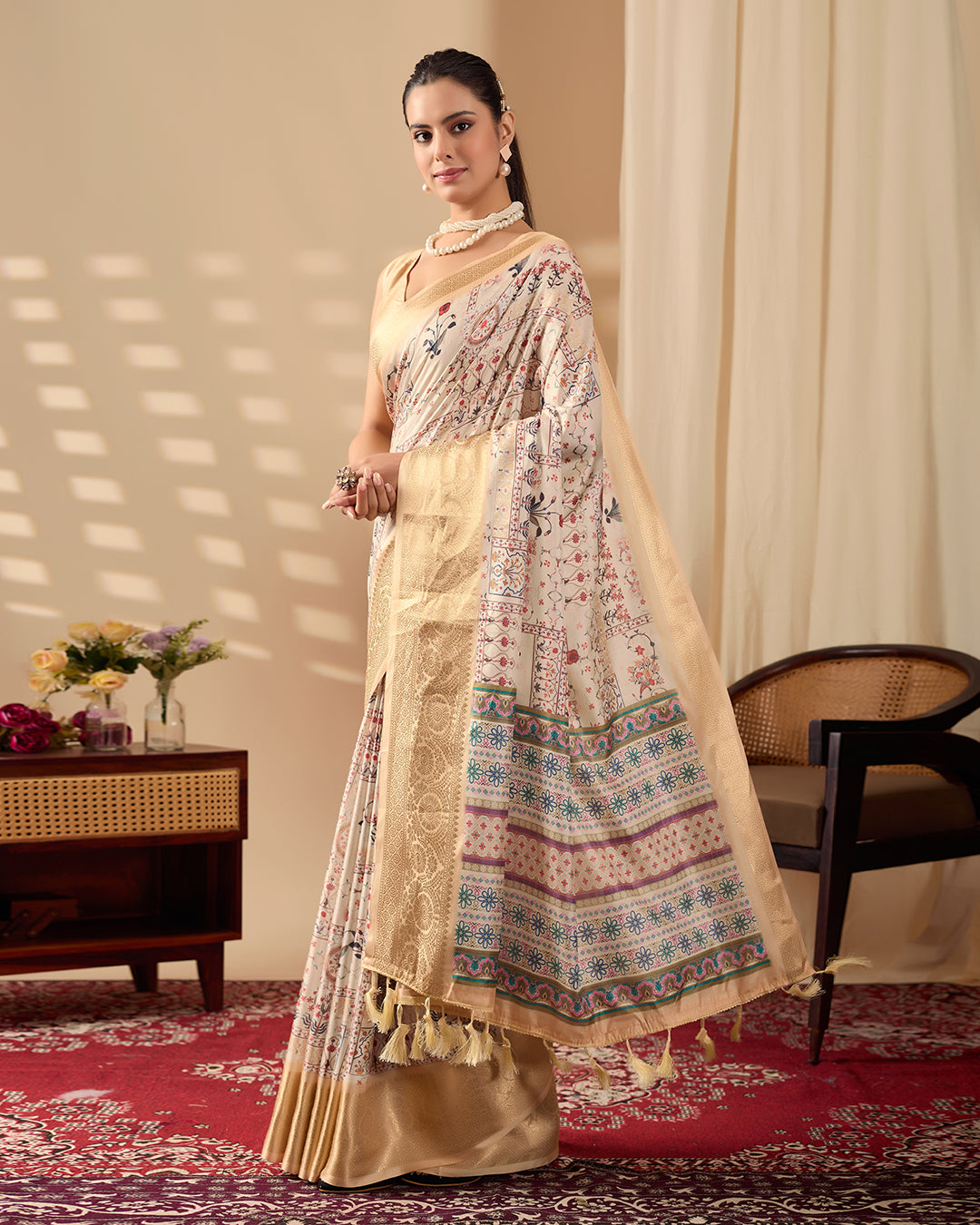 Soft Lichi Silk Saree adorned with graceful ethnic digital prints and complemented by a luxurious golden zari woven border