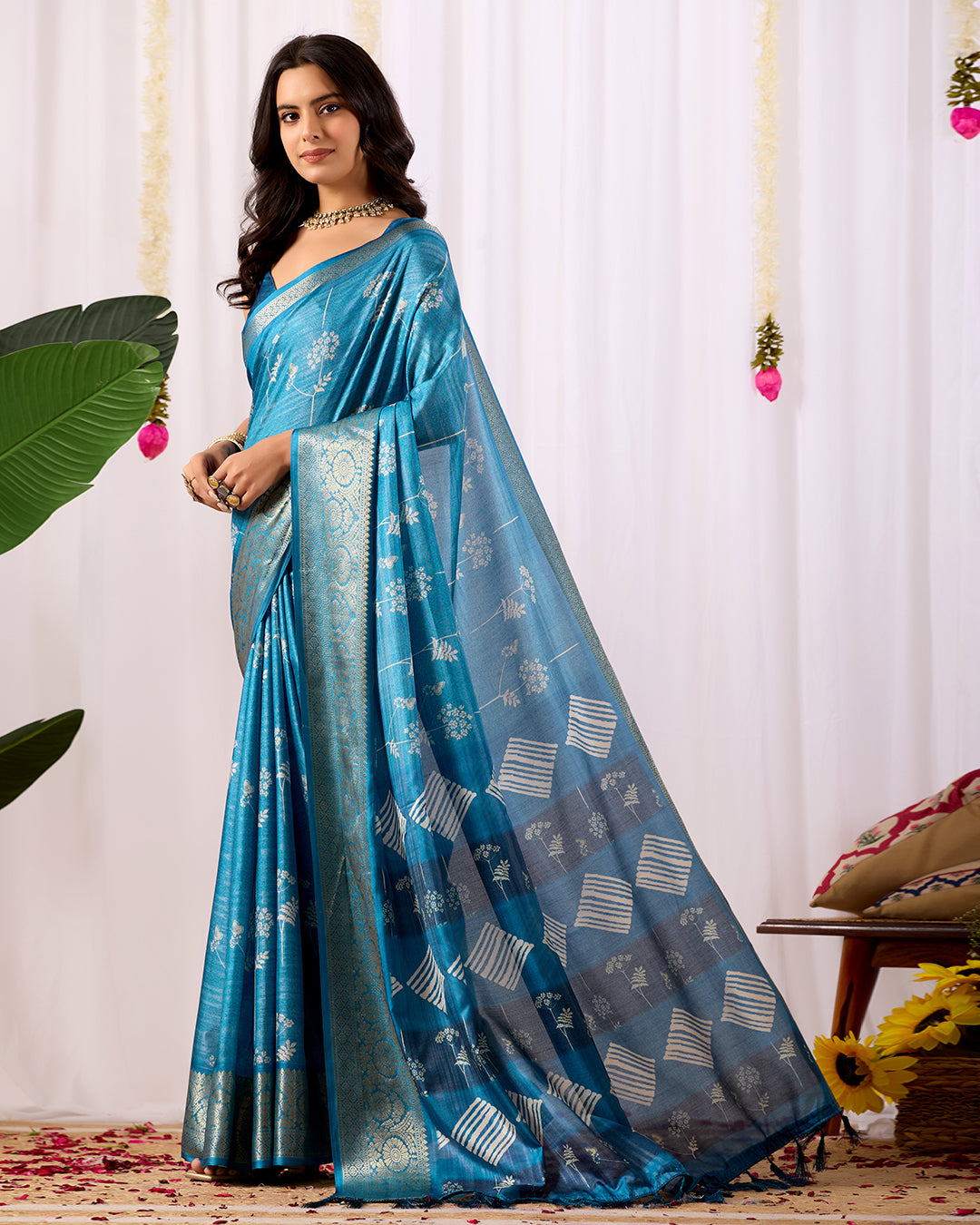 Premium Soft Lichi Silk Saree highlighted with graceful silver zari weaving and intricate ethnic motifs