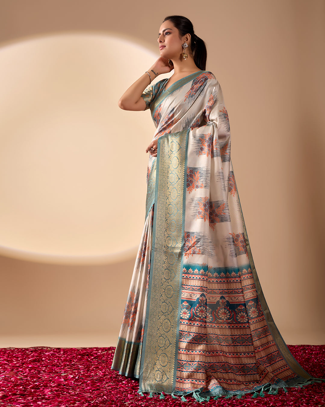 Elegant Soft Lichi Silk Saree in a refined ivory and teal tone, featuring traditional motifs and intricate digital prints enhanced with a golden zari border