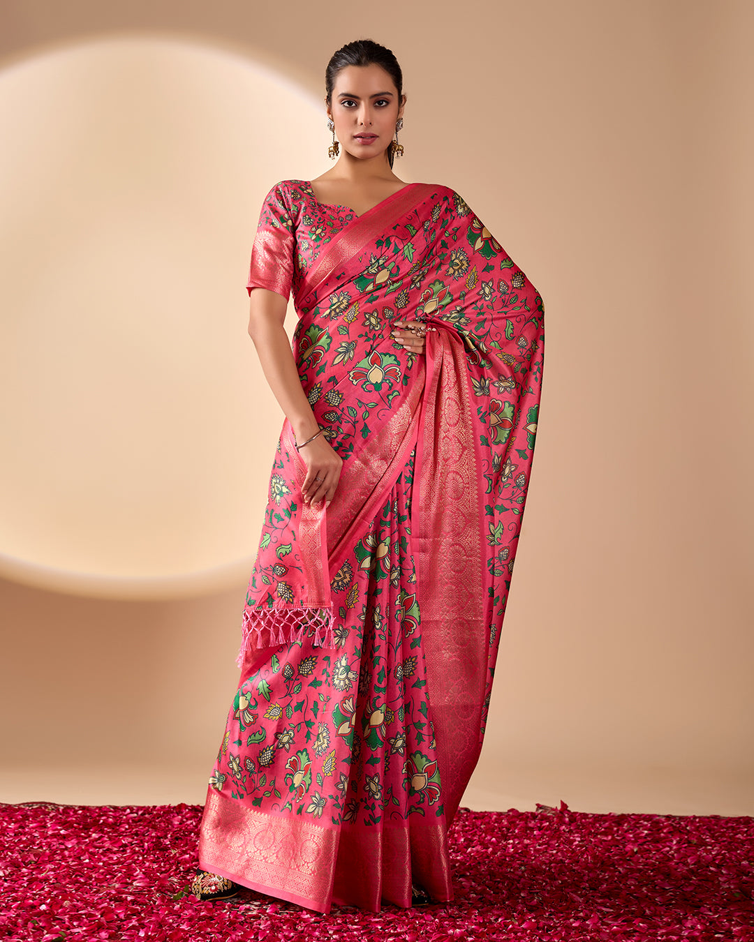 Soft Lichi Silk Saree enriched with vibrant floral digital prints and a beautifully woven zari border