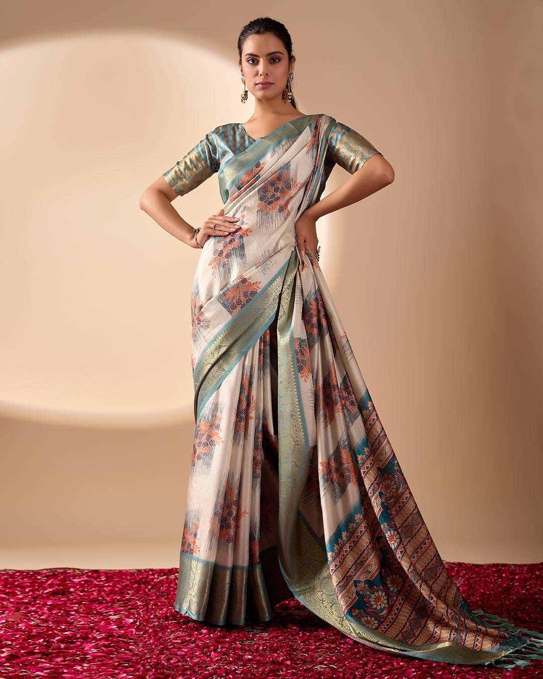 Elegant Soft Lichi Silk Saree in a refined ivory and teal tone, featuring traditional motifs and intricate digital prints enhanced with a golden zari border
