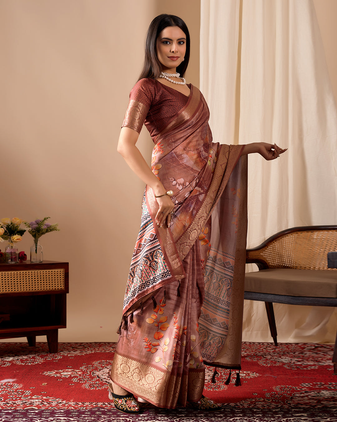 Soft Lichi Silk Saree adorned with graceful Patola-inspired motifs and a rich woven border