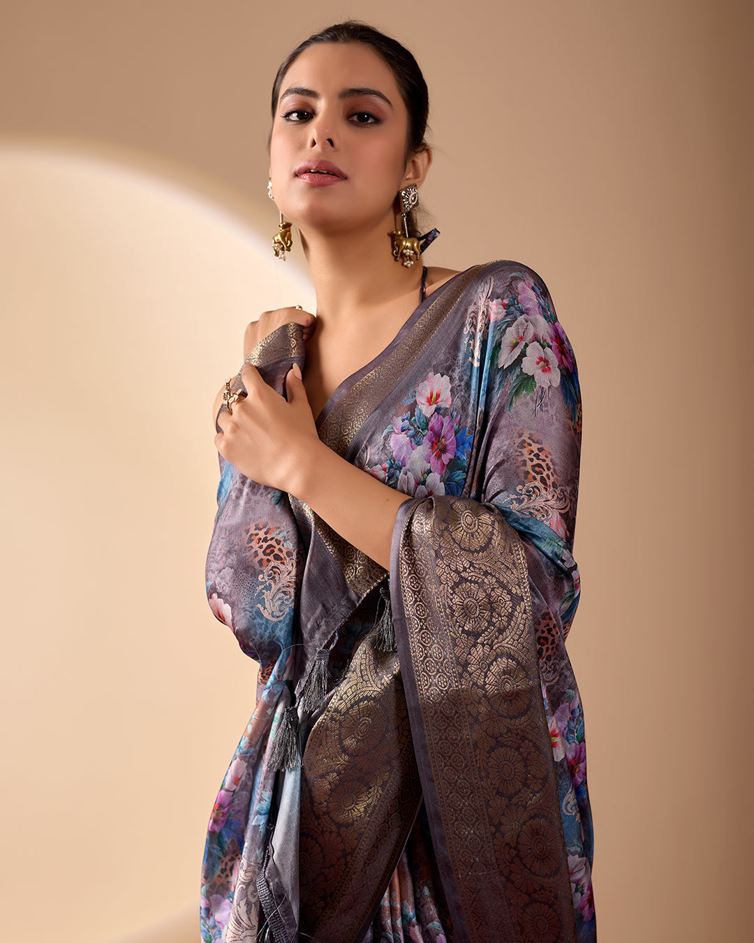 Gorgeous Soft Lichi Silk Saree featuring enchanting digital floral prints on a rich smoky grey base with an intricate golden zari border