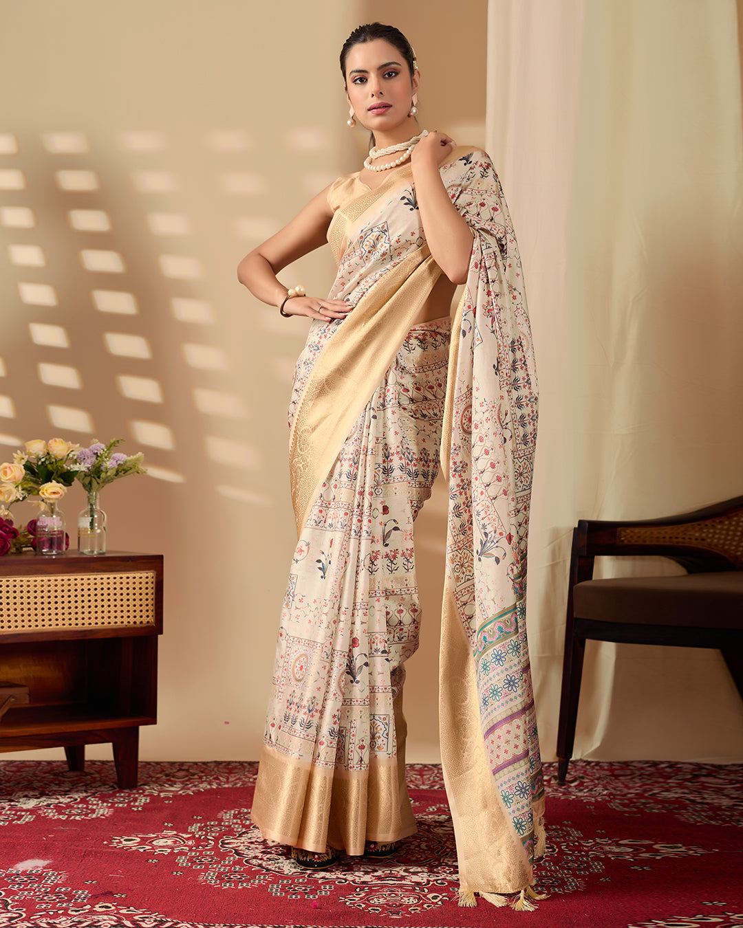 Soft Lichi Silk Saree adorned with graceful ethnic digital prints and complemented by a luxurious golden zari woven border