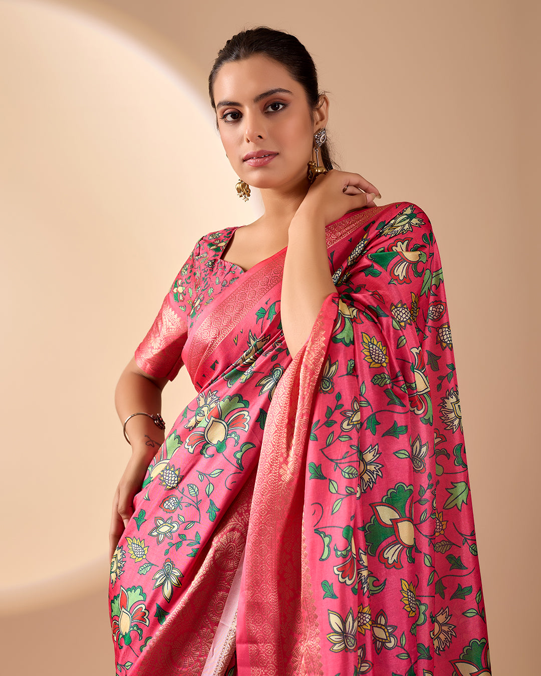 Soft Lichi Silk Saree enriched with vibrant floral digital prints and a beautifully woven zari border
