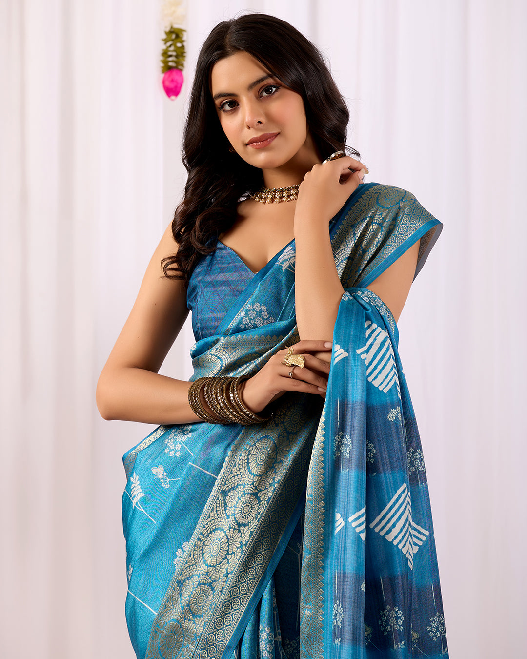 Premium Soft Lichi Silk Saree highlighted with graceful silver zari weaving and intricate ethnic motifs