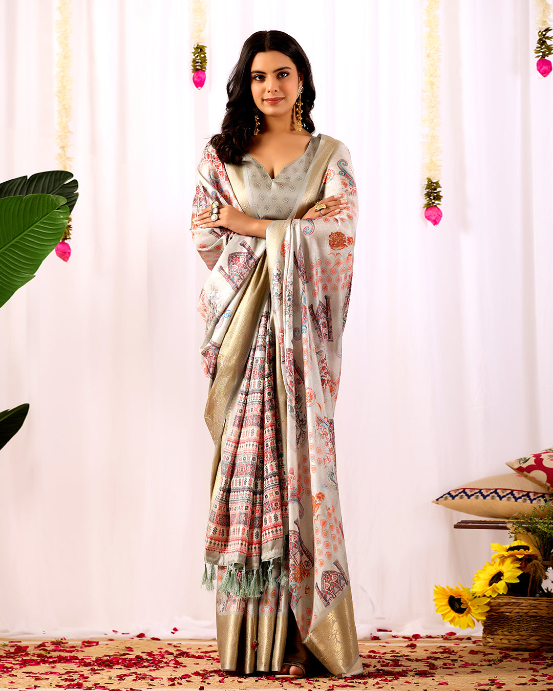 Elegant Soft Lichi Silk Saree featuring royal ethnic motifs with a lavish golden zari woven border