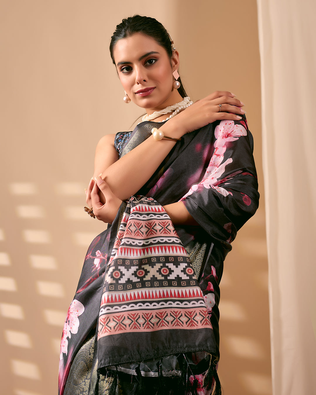 Stunning Soft Lichi Silk Saree featuring digital floral artistry on a deep elegant base with a rich golden zari border