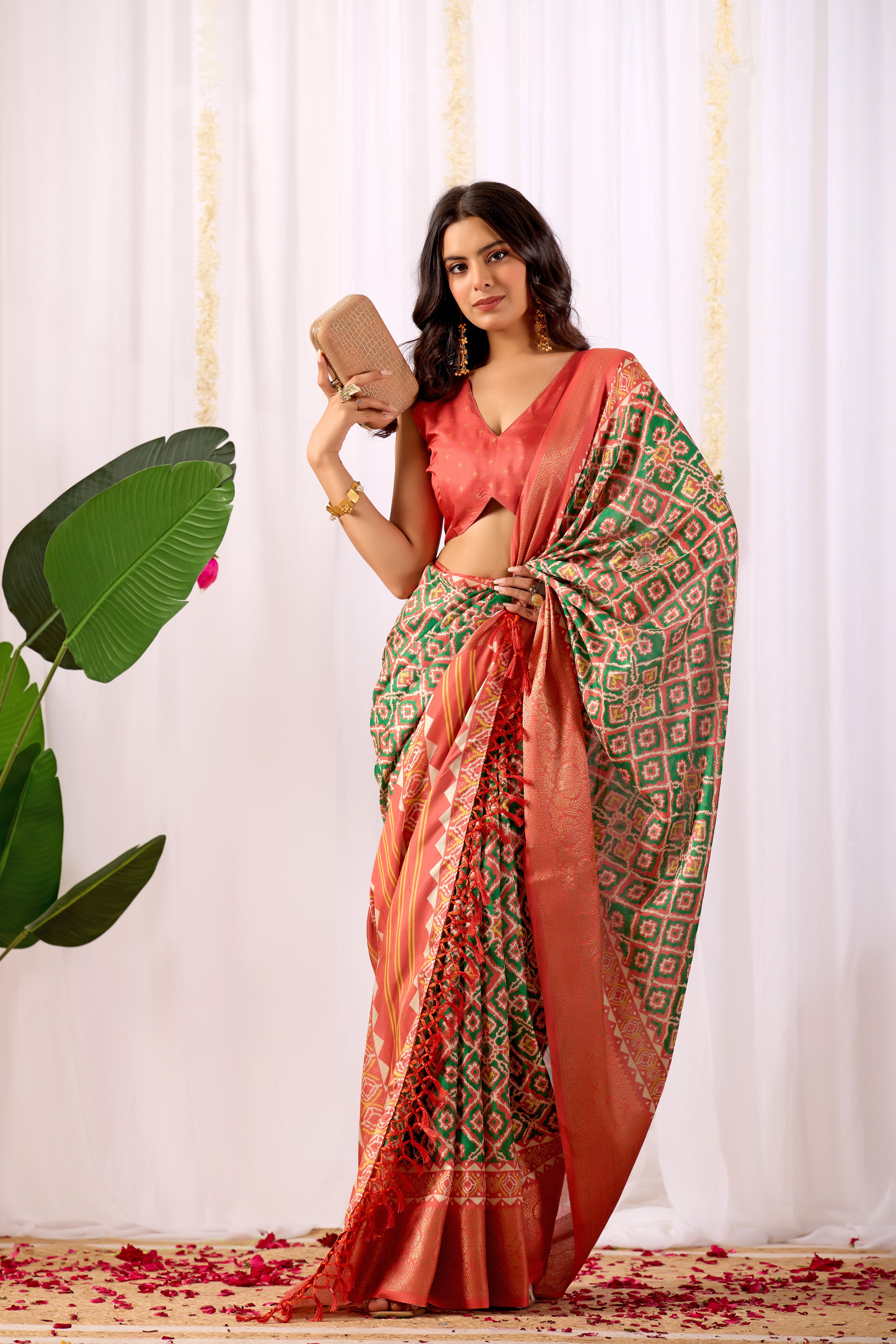 Soft Lichi Silk Saree with Exquisite Patola-Inspired Geometric Print and a Lavish Zari Woven Border