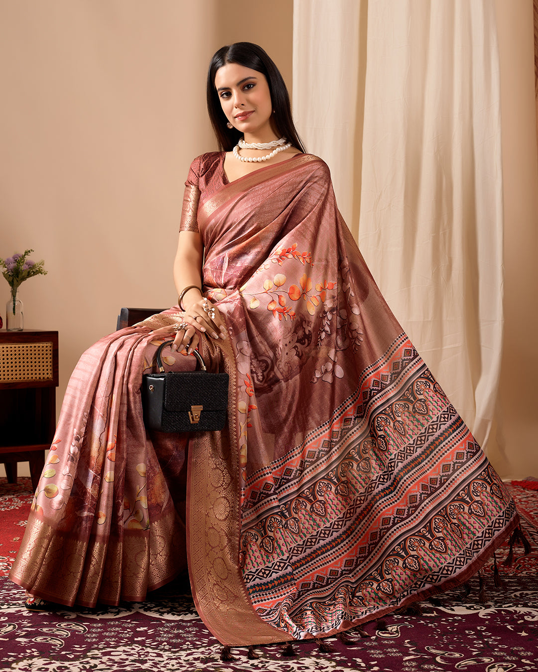 Soft Lichi Silk Saree adorned with graceful Patola-inspired motifs and a rich woven border