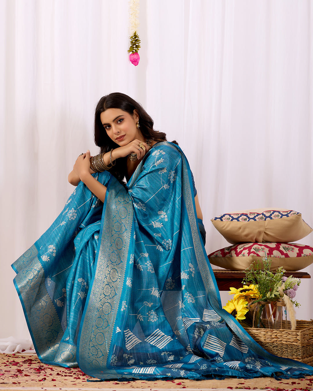 Premium Soft Lichi Silk Saree highlighted with graceful silver zari weaving and intricate ethnic motifs