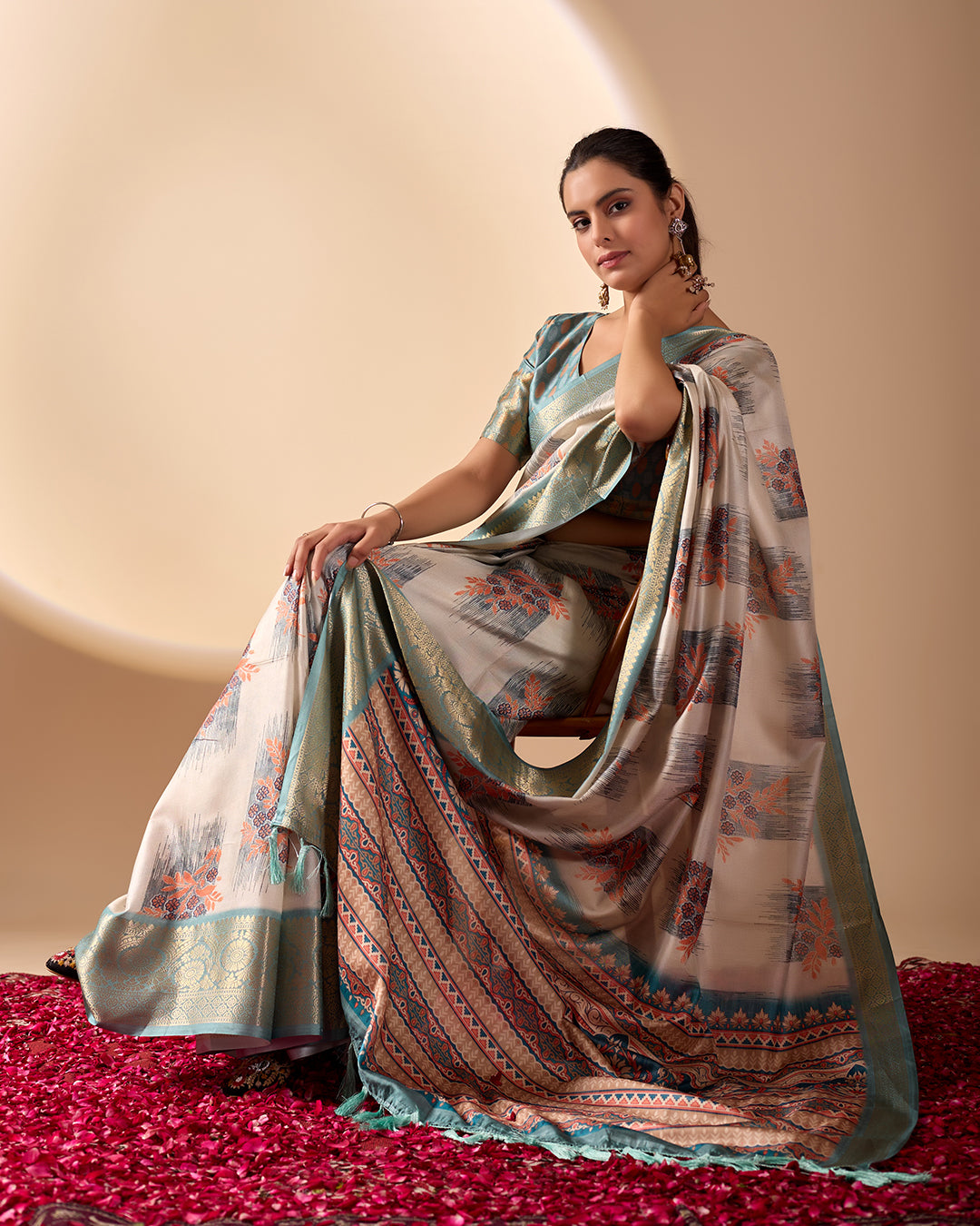 Elegant Soft Lichi Silk Saree in a refined ivory and teal tone, featuring traditional motifs and intricate digital prints enhanced with a golden zari border
