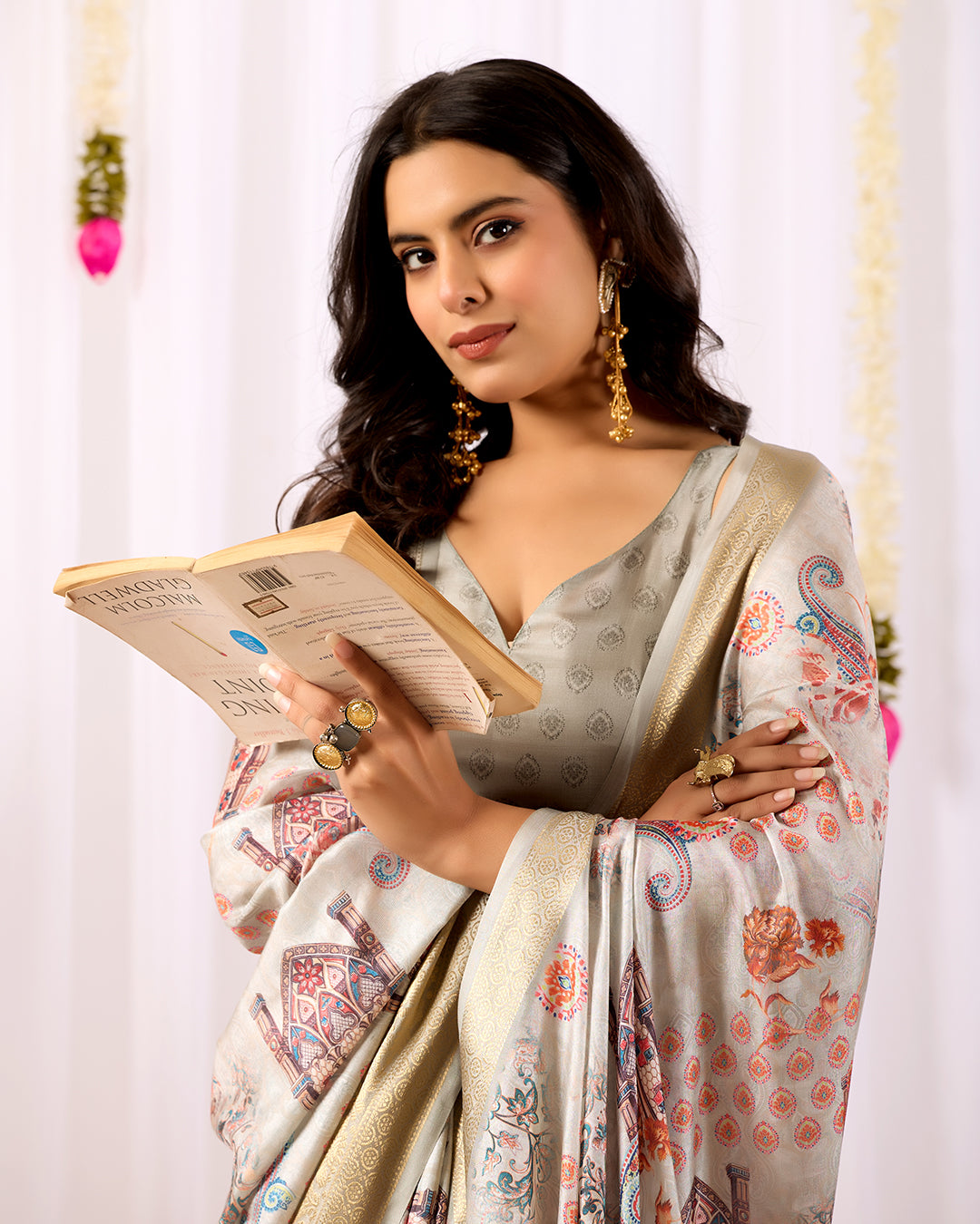 Elegant Soft Lichi Silk Saree featuring royal ethnic motifs with a lavish golden zari woven border