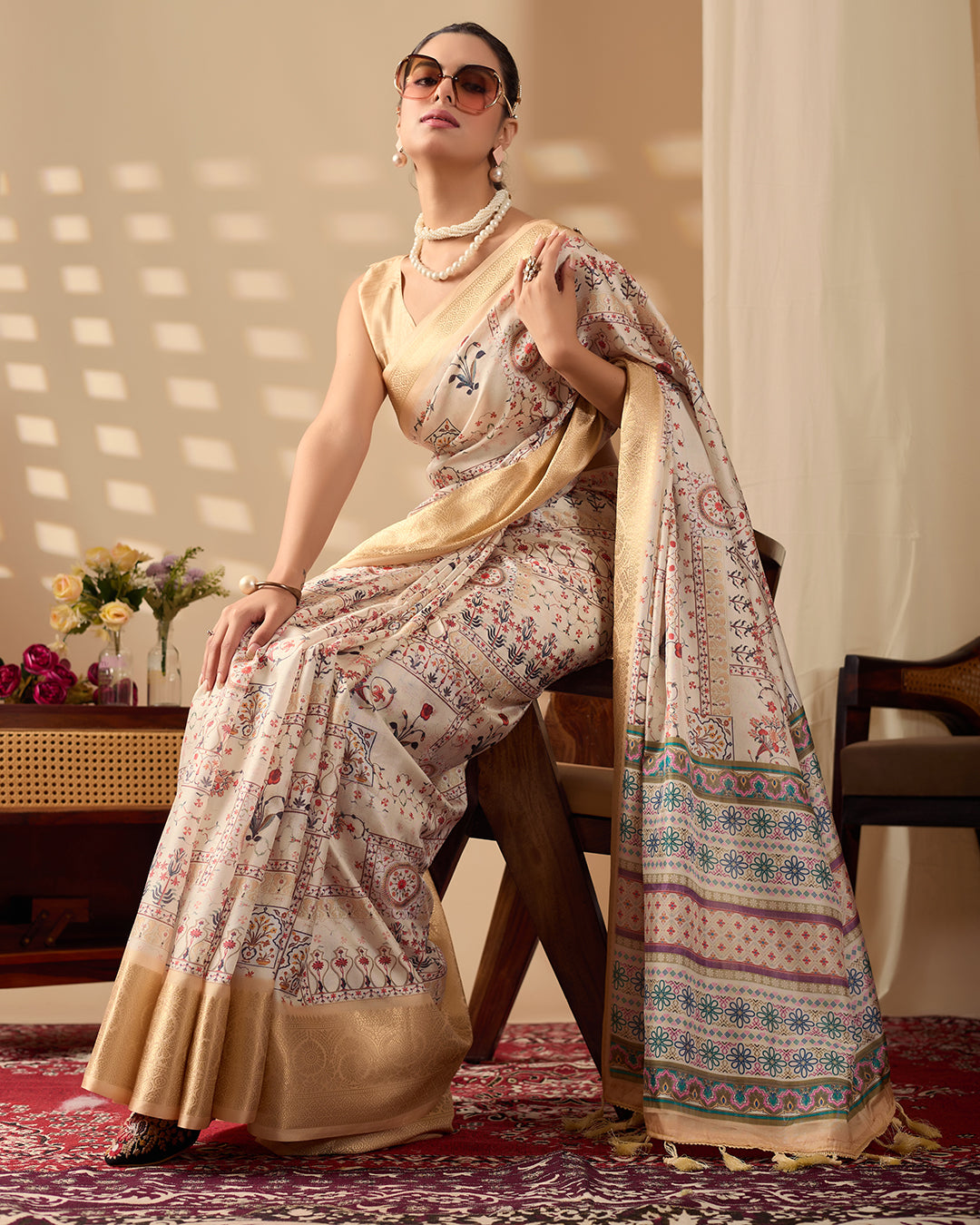 Soft Lichi Silk Saree adorned with graceful ethnic digital prints and complemented by a luxurious golden zari woven border