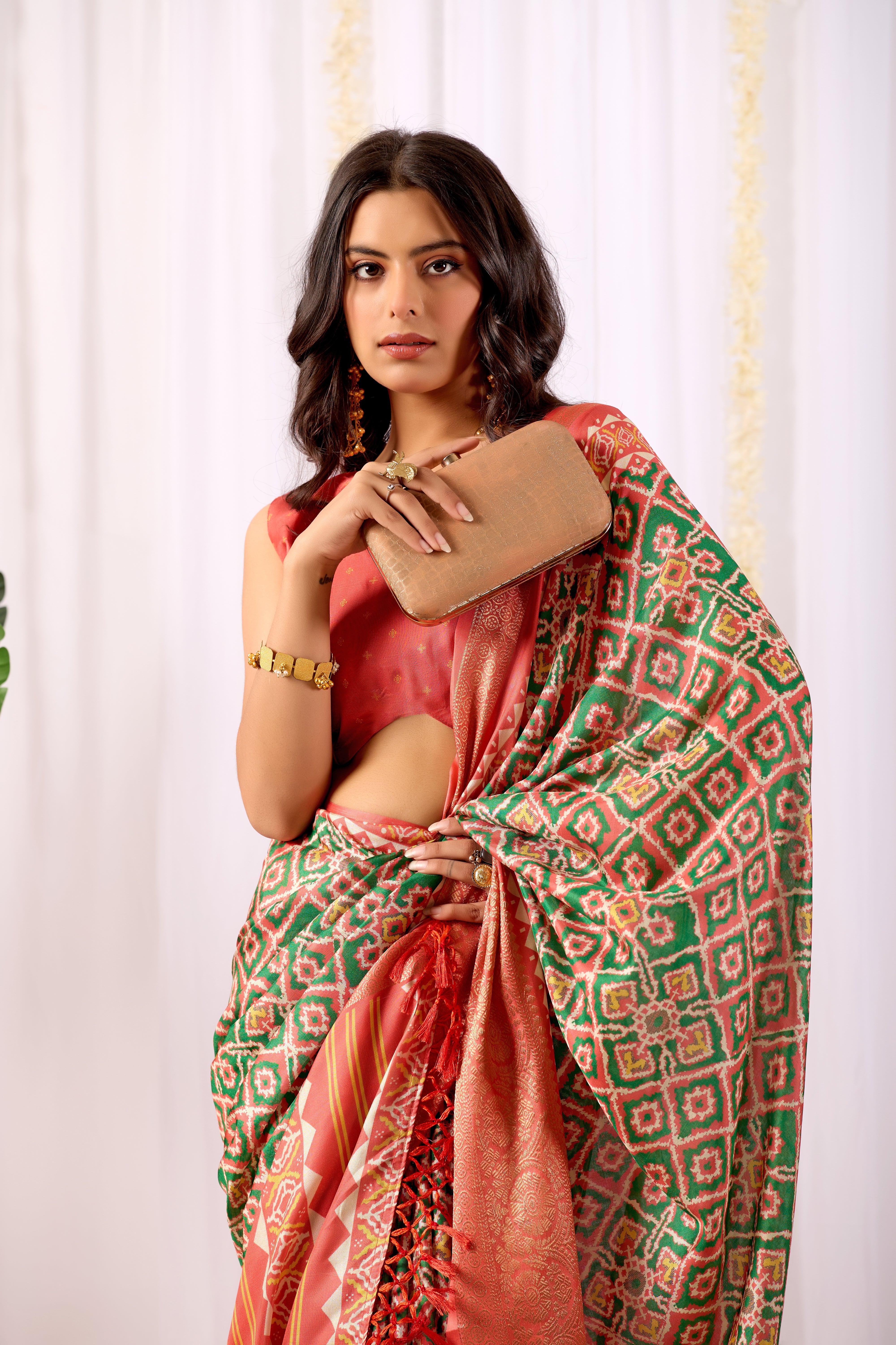 Soft Lichi Silk Saree with Exquisite Patola-Inspired Geometric Print and a Lavish Zari Woven Border