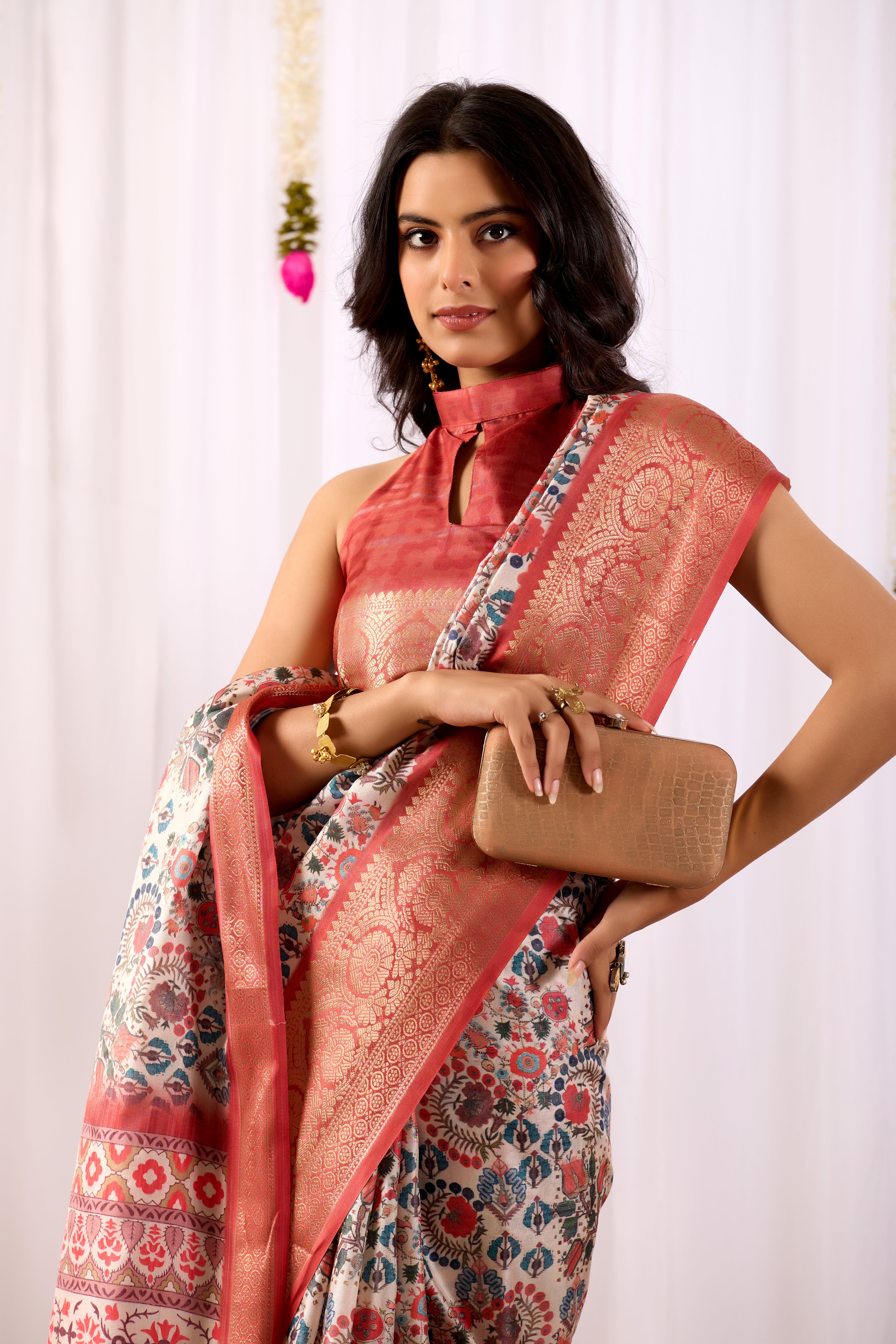 Premium Soft Lichi Silk Saree with elegant Patola-inspired geometric prints beautifully crafted with a luxurious zari woven border