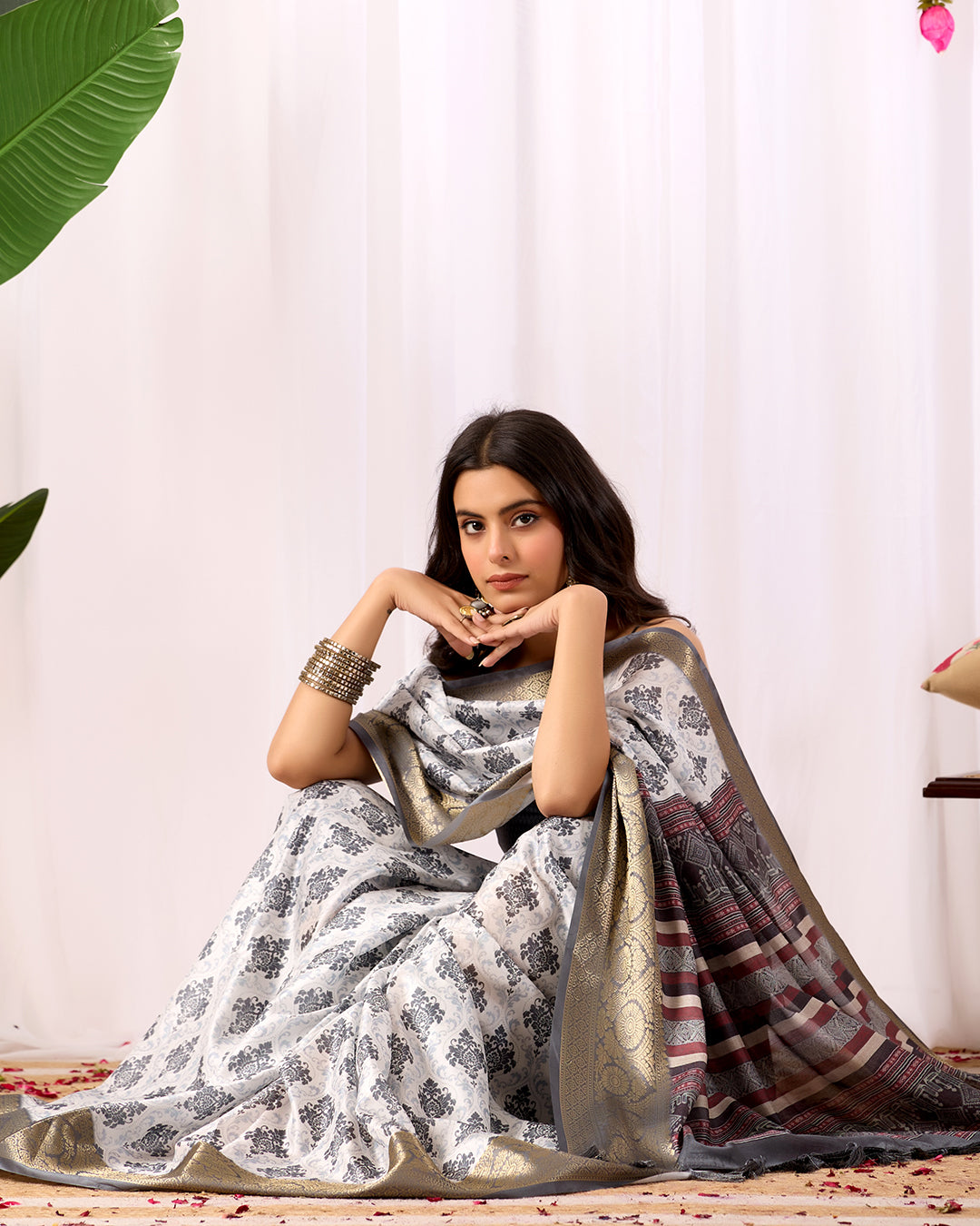 Premium Soft Lichi Silk Saree in Elegant White Base featuring intricate black ethnic motifs