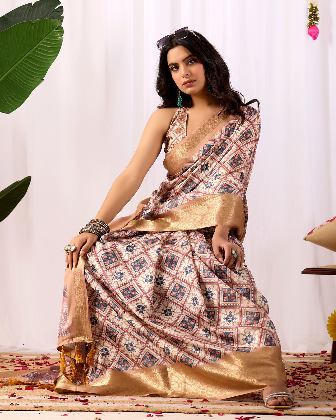 Premium Soft Lichi Silk Saree featuring elegant traditional geometric patterns, beautifully enhanced with a luxurious golden zari woven border