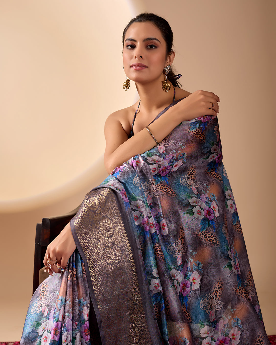 Gorgeous Soft Lichi Silk Saree featuring enchanting digital floral prints on a rich smoky grey base with an intricate golden zari border