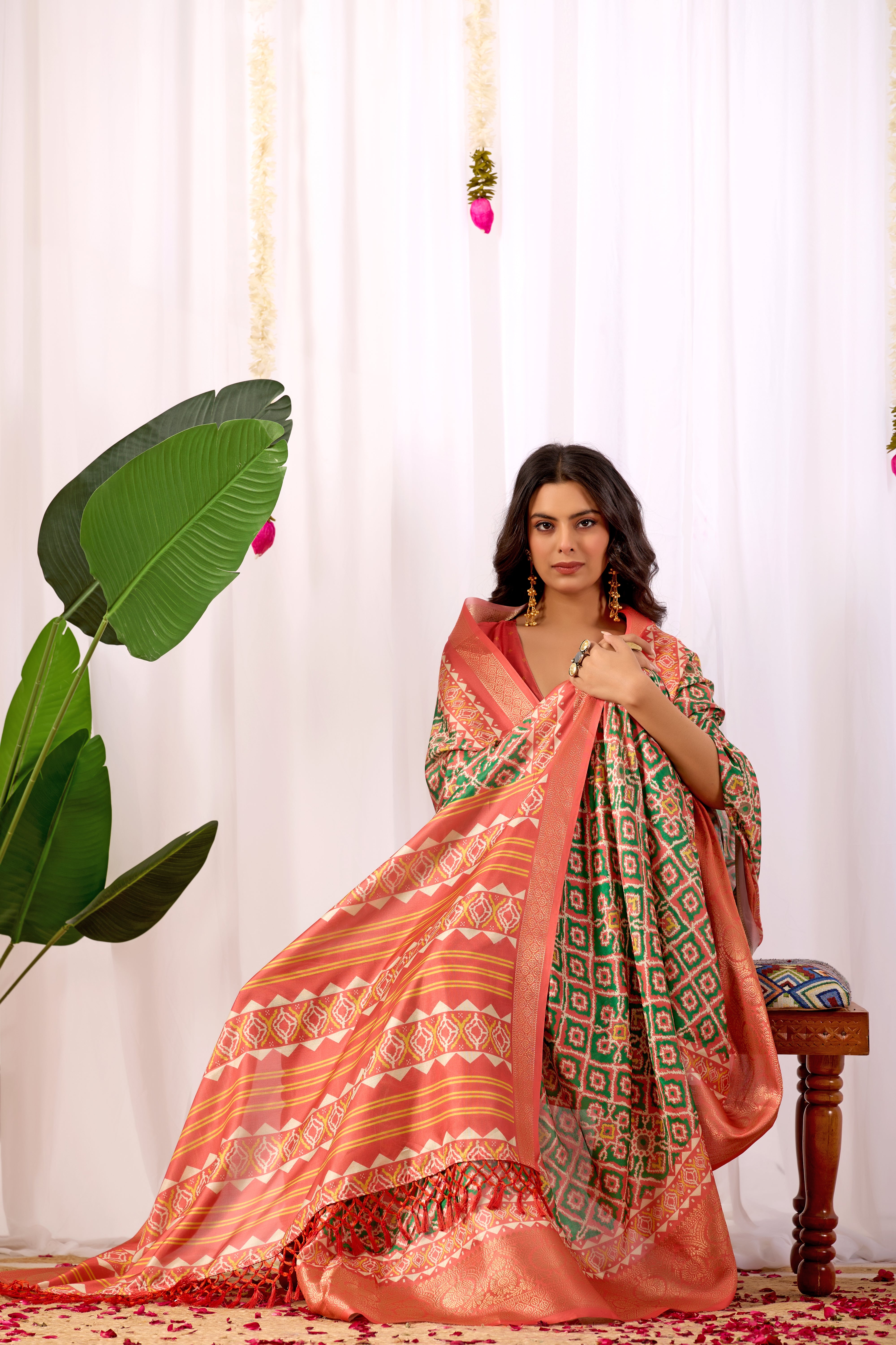 Soft Lichi Silk Saree with Exquisite Patola-Inspired Geometric Print and a Lavish Zari Woven Border