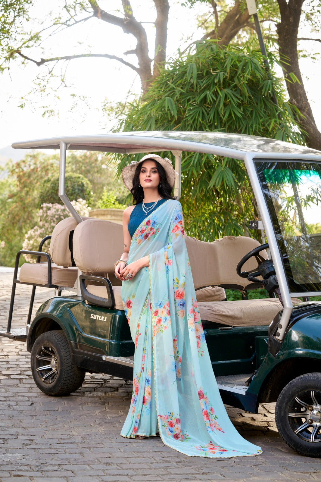 Weightless charm, pearled grace Saree