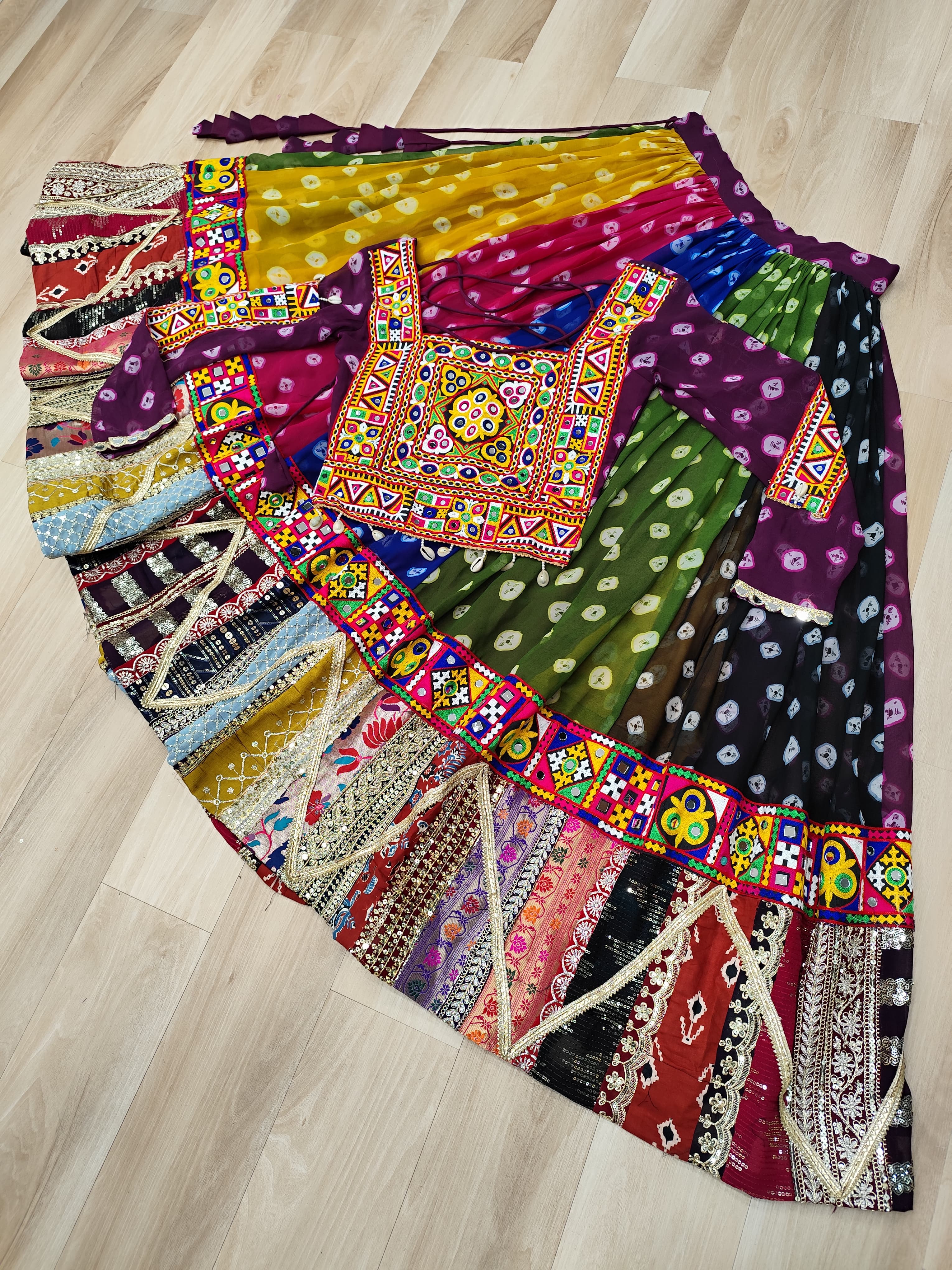 Raangilo Bandhani Mirrorwork Navratna Lehenga