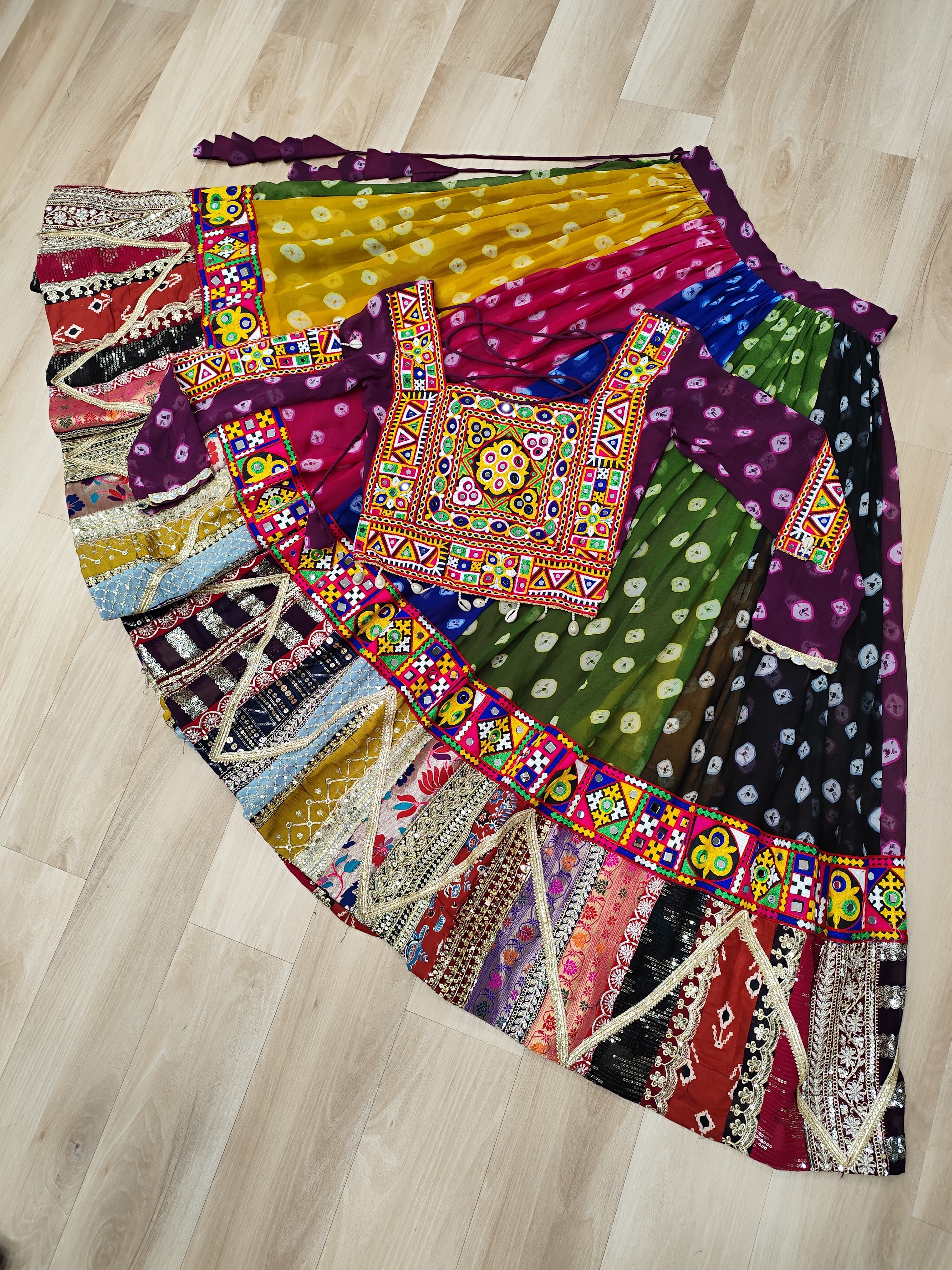 Raangilo Bandhani Mirrorwork Navratna Lehenga