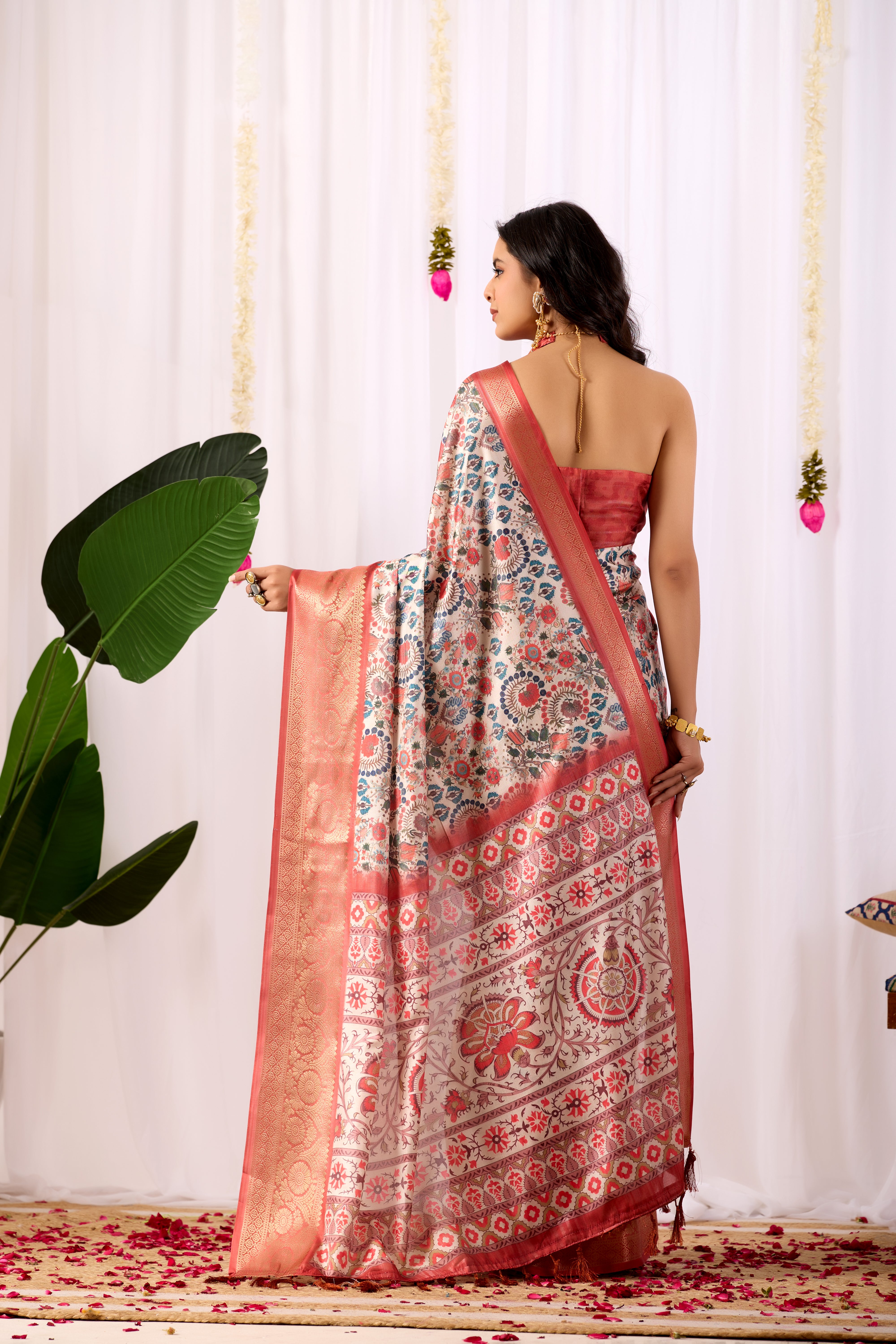 Premium Soft Lichi Silk Saree with elegant Patola-inspired geometric prints beautifully crafted with a luxurious zari woven border