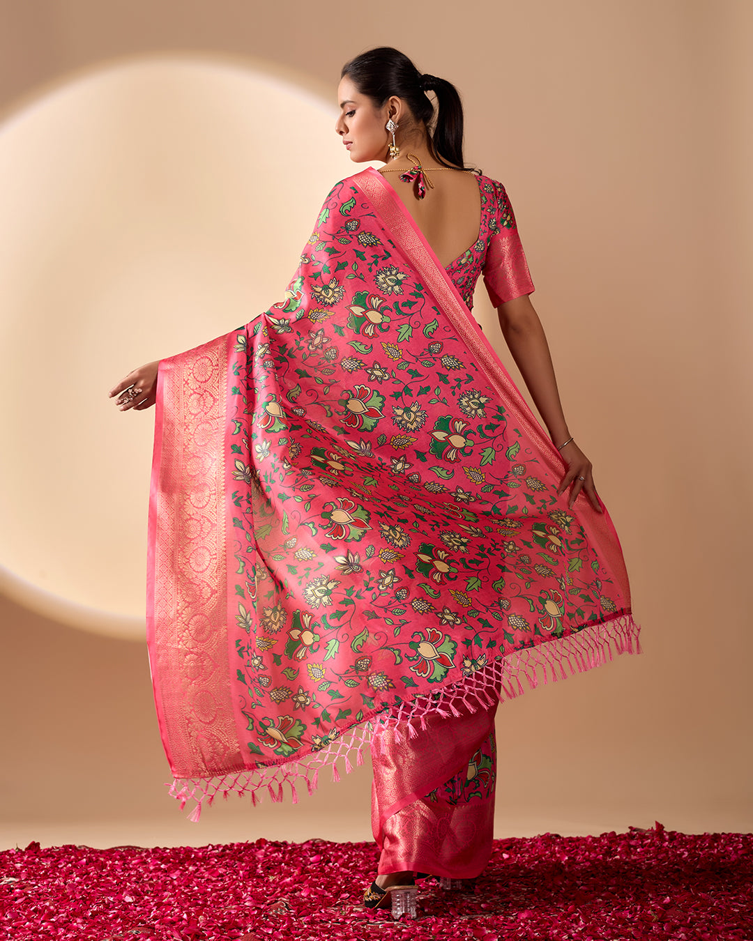 Soft Lichi Silk Saree enriched with vibrant floral digital prints and a beautifully woven zari border