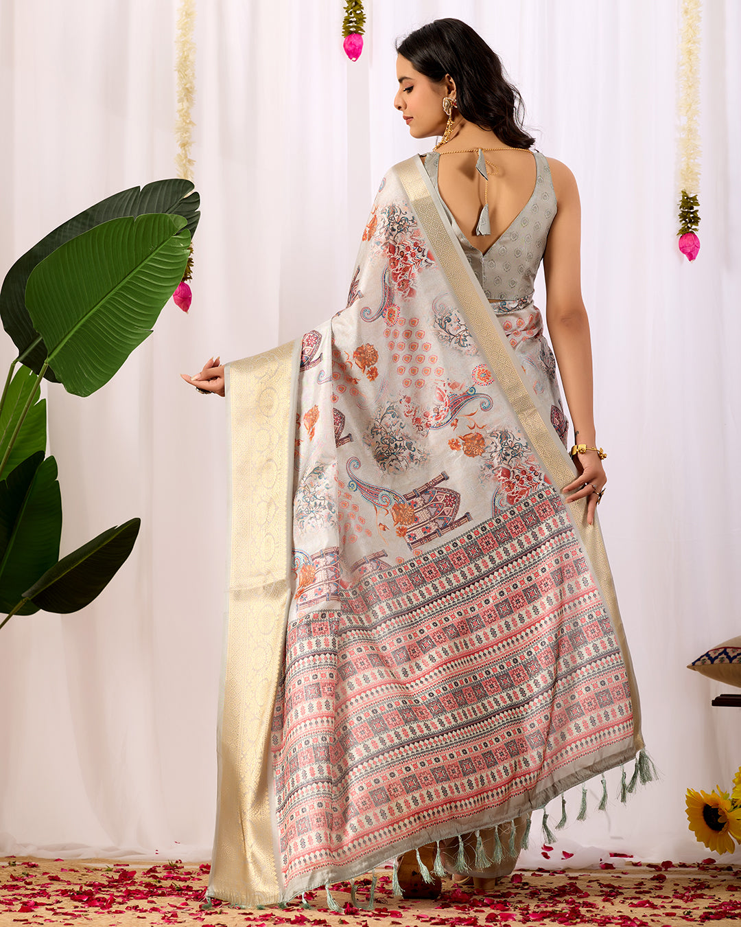 Elegant Soft Lichi Silk Saree featuring royal ethnic motifs with a lavish golden zari woven border