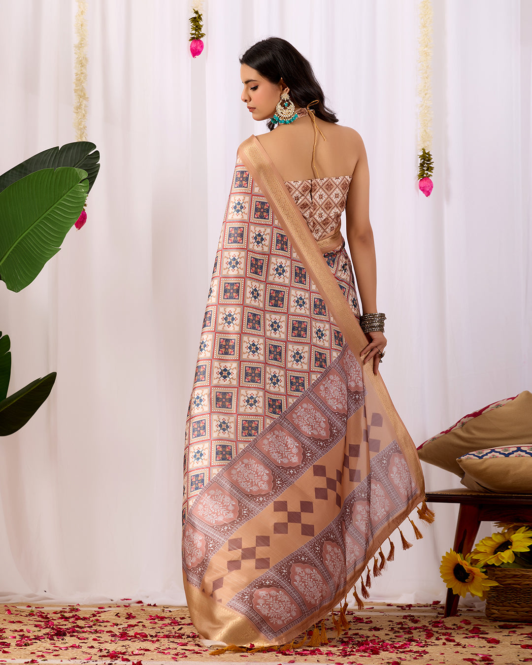 Premium Soft Lichi Silk Saree featuring elegant traditional geometric patterns, beautifully enhanced with a luxurious golden zari woven border