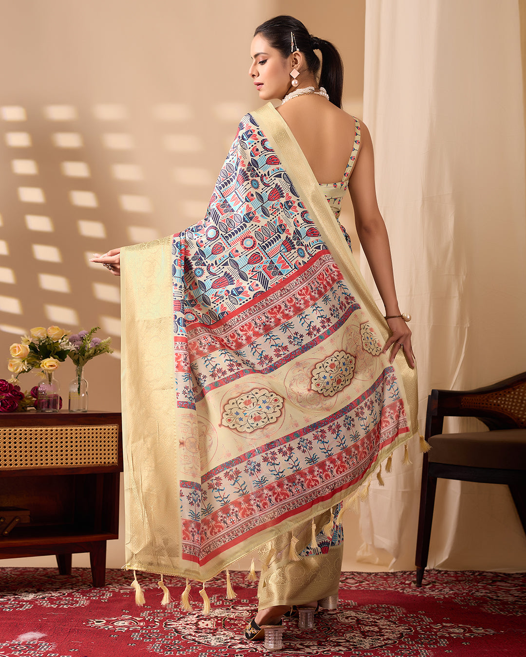 Exquisite Soft Lichi Silk Saree enriched with artistic multicolor digital weaving and a grand golden zari border